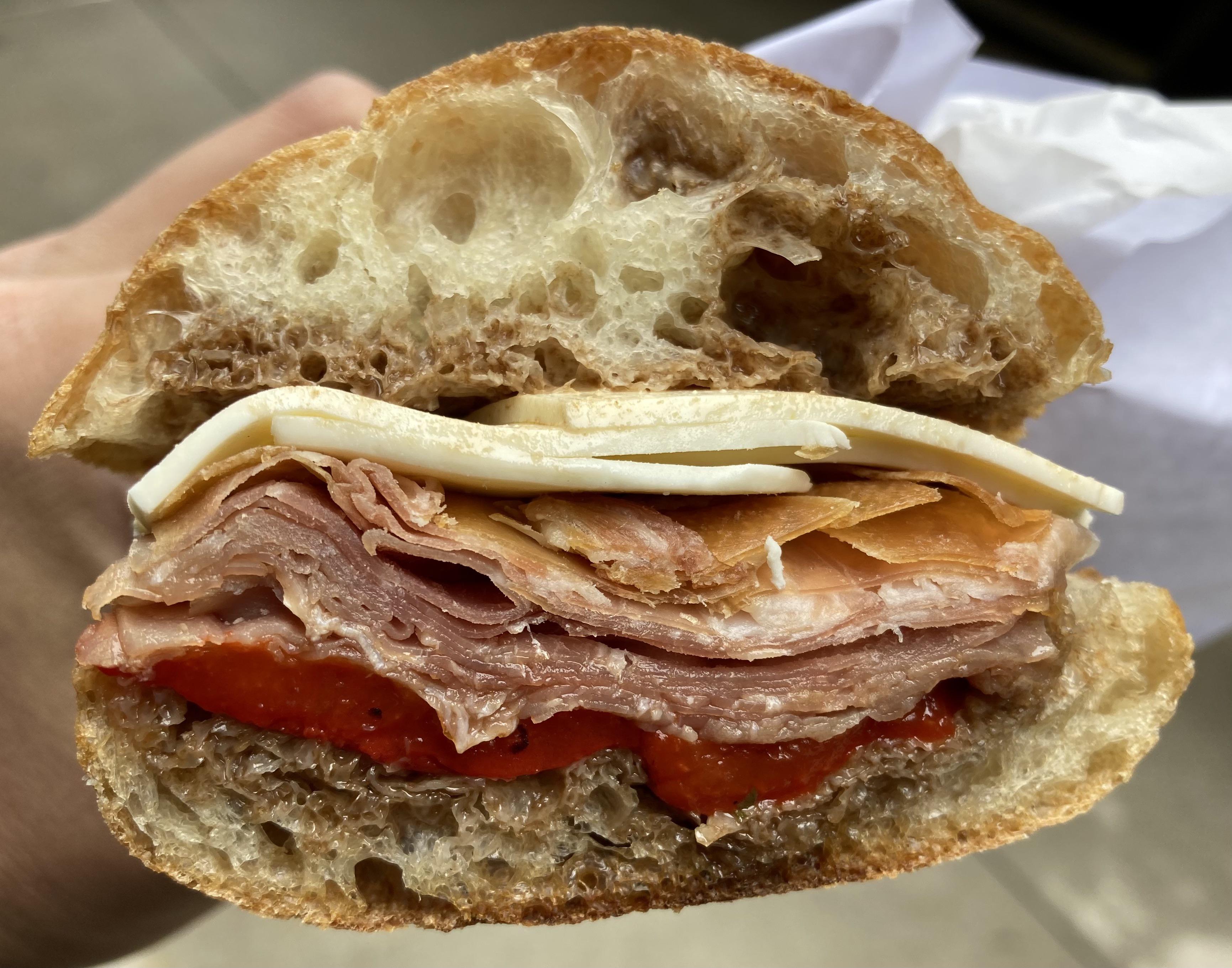 Prosciutto, mozzarella, roasted peppers, balsamic, and olive oil r