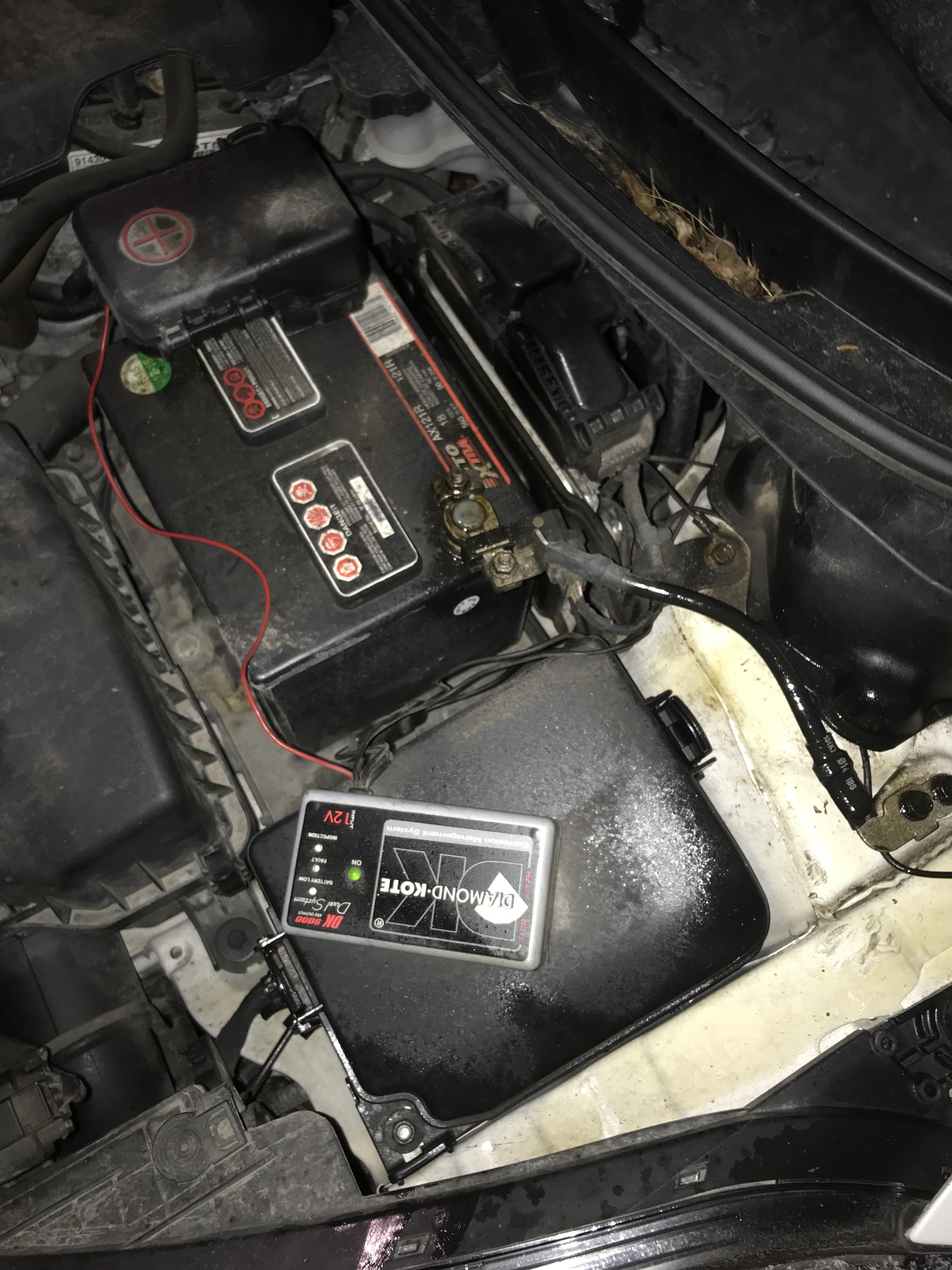 Found this hooked up to my friends car, pretty sure this is a scam