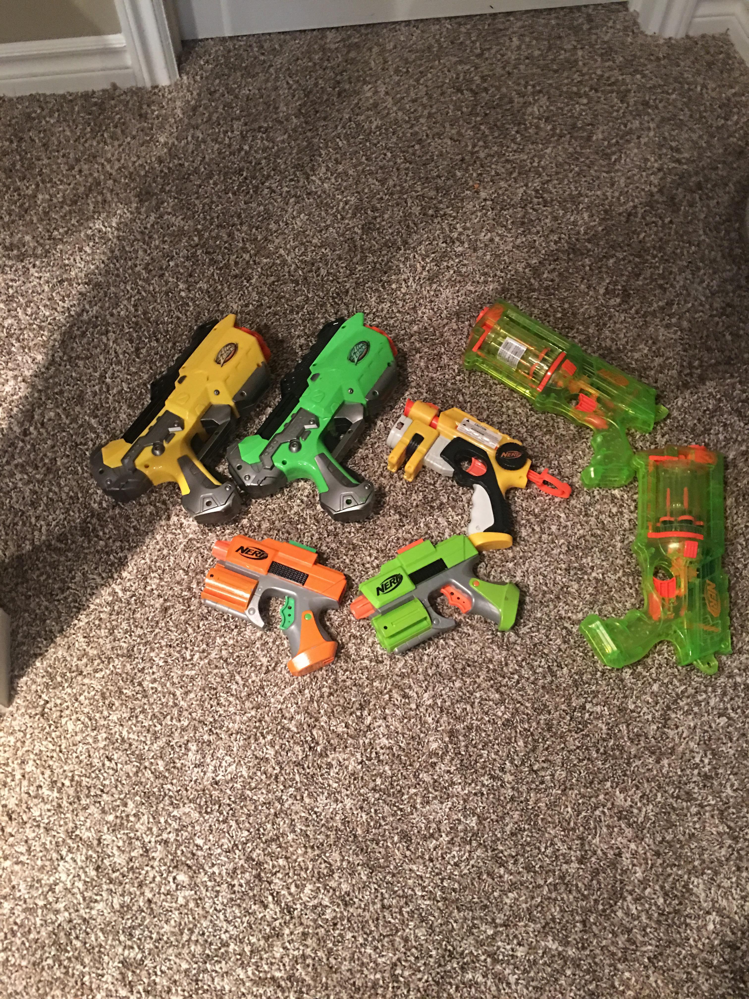 Are any of these nerf guns rare? Also could anyone identify the orange and green nerf ones? r/Nerf