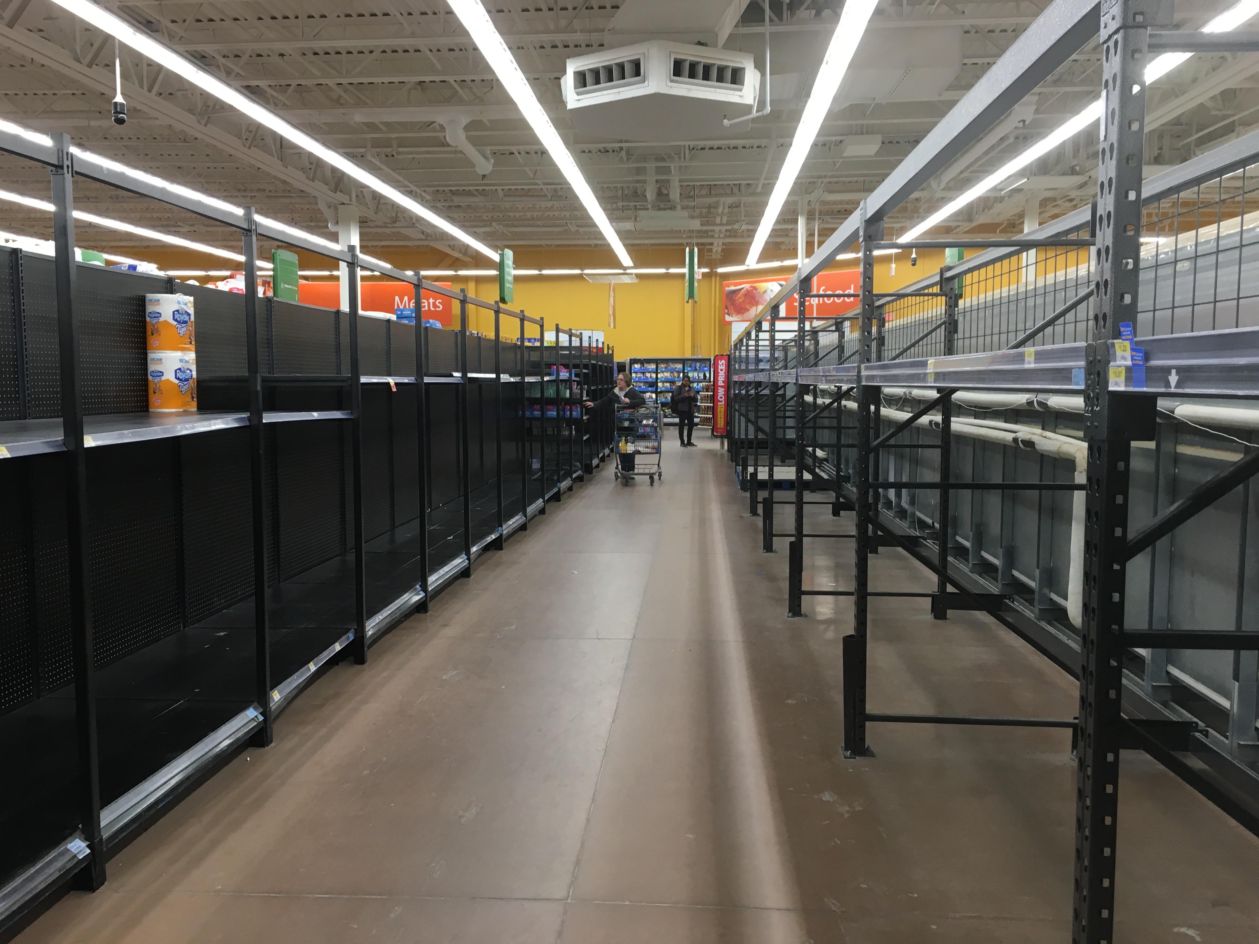 Toilet paper aisle at the Walmart on Chemong. Flour, water, canned