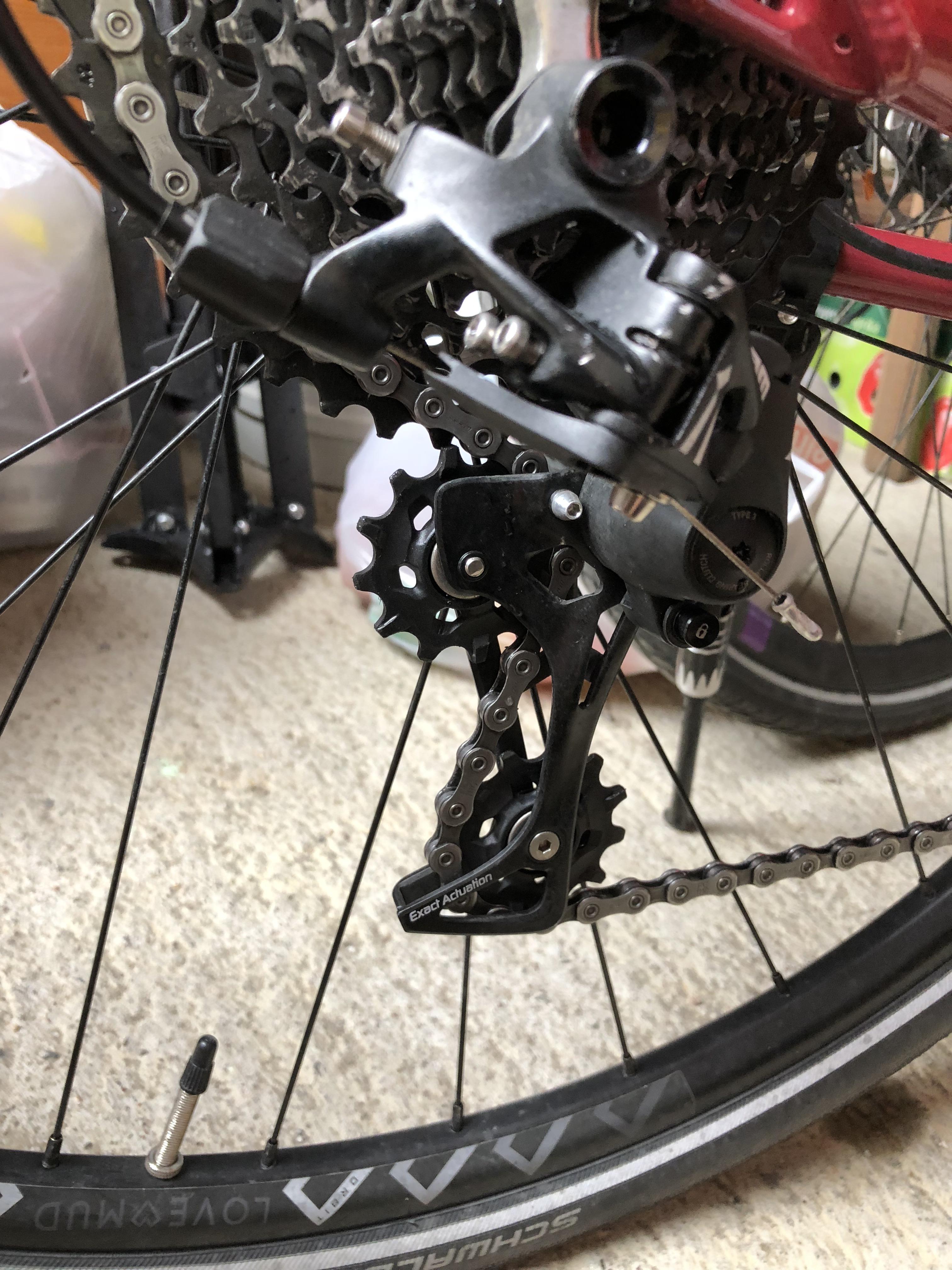 How to stop rear derailleur cogs from making a grinding noise? r