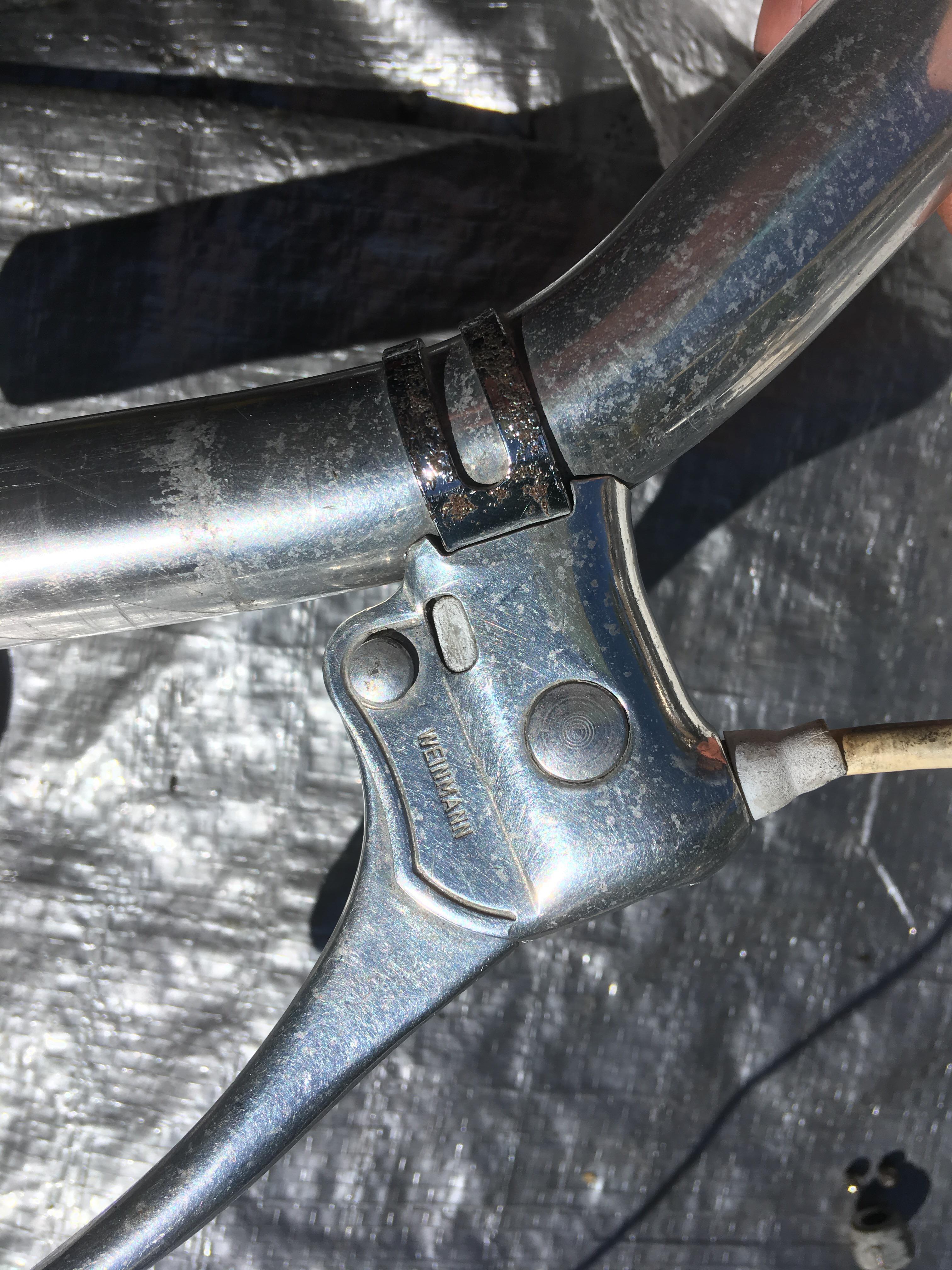 Any idea how to loosen these brake levers so I can slide them off the