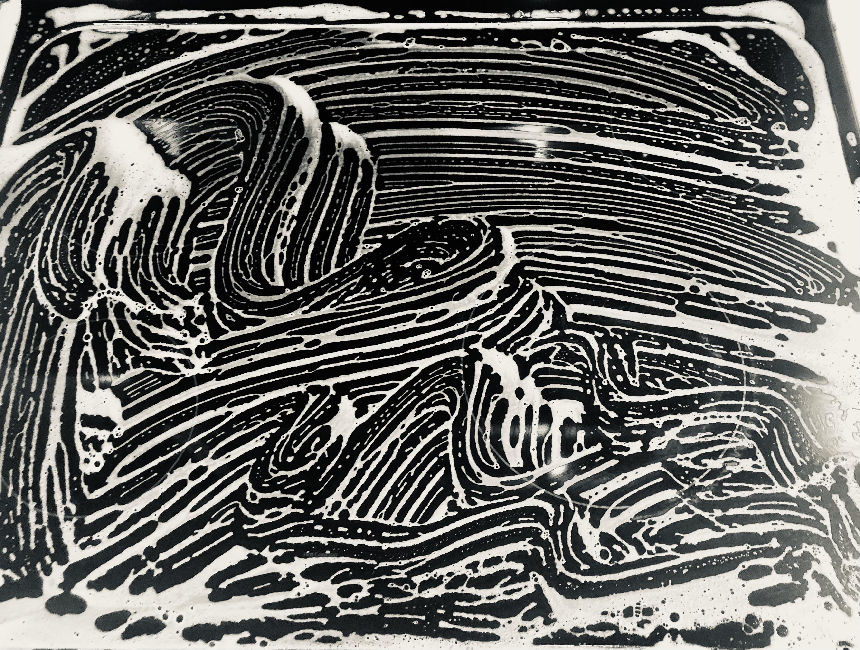 I was cleaning the stove top with dish soap and... r/AccidentalArtGallery