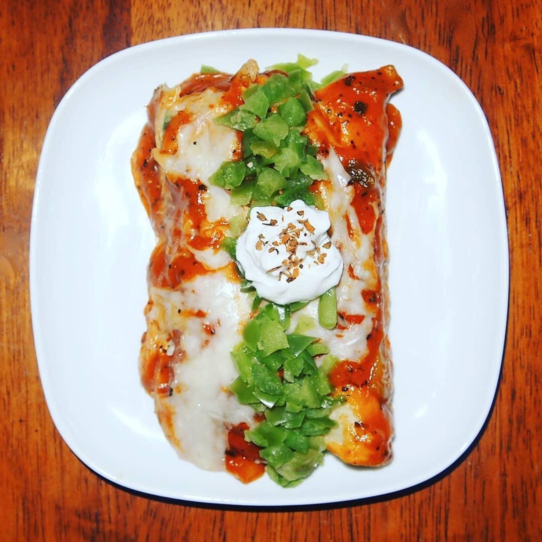 Low carb, low calorie chicken enchiladas corn tortillas, shredded chicken, lowfat mozzarella