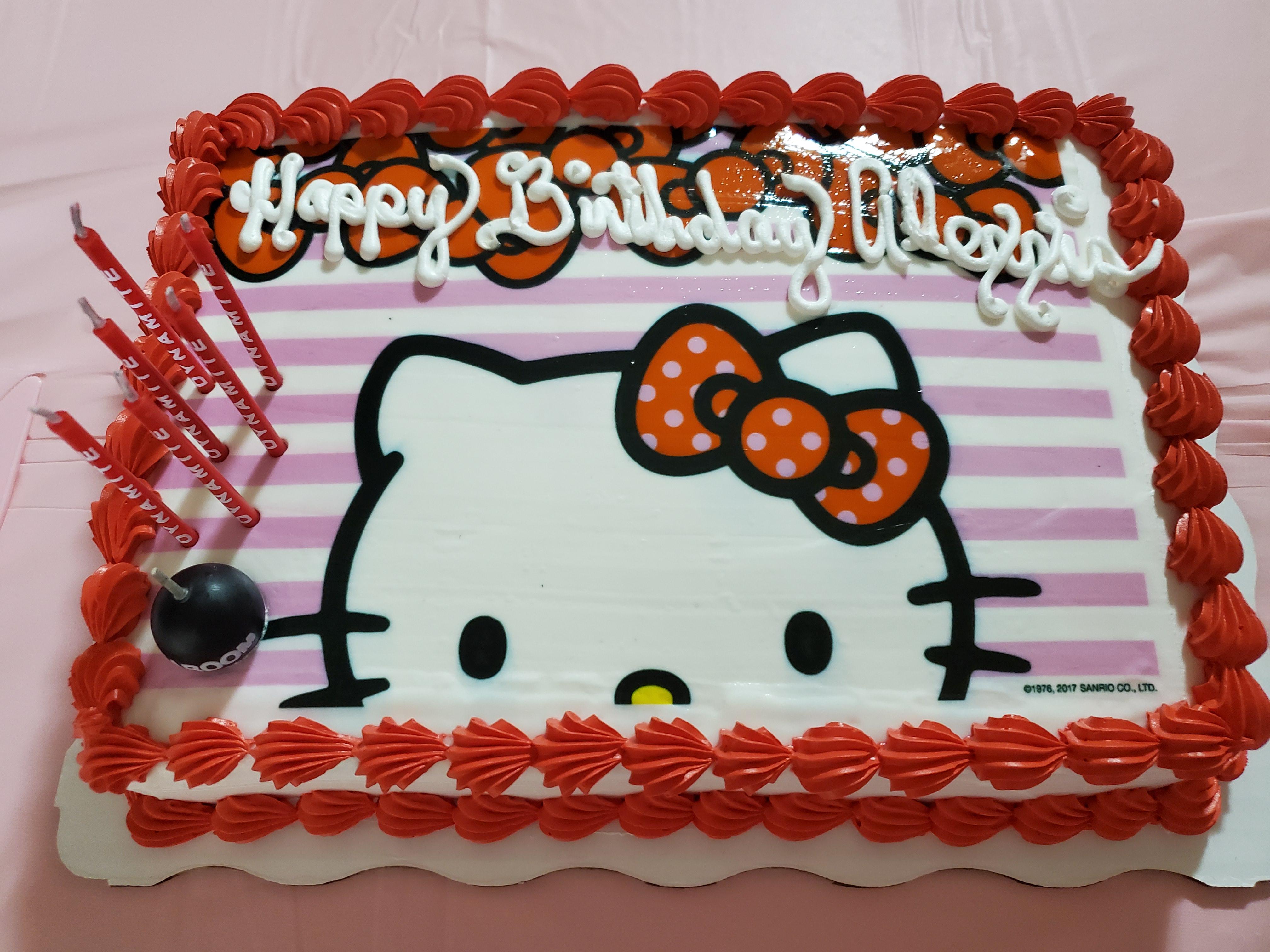 I got a hello kitty cake for my birthday!! And we didn't have enough candles, I'm not 7 lol r