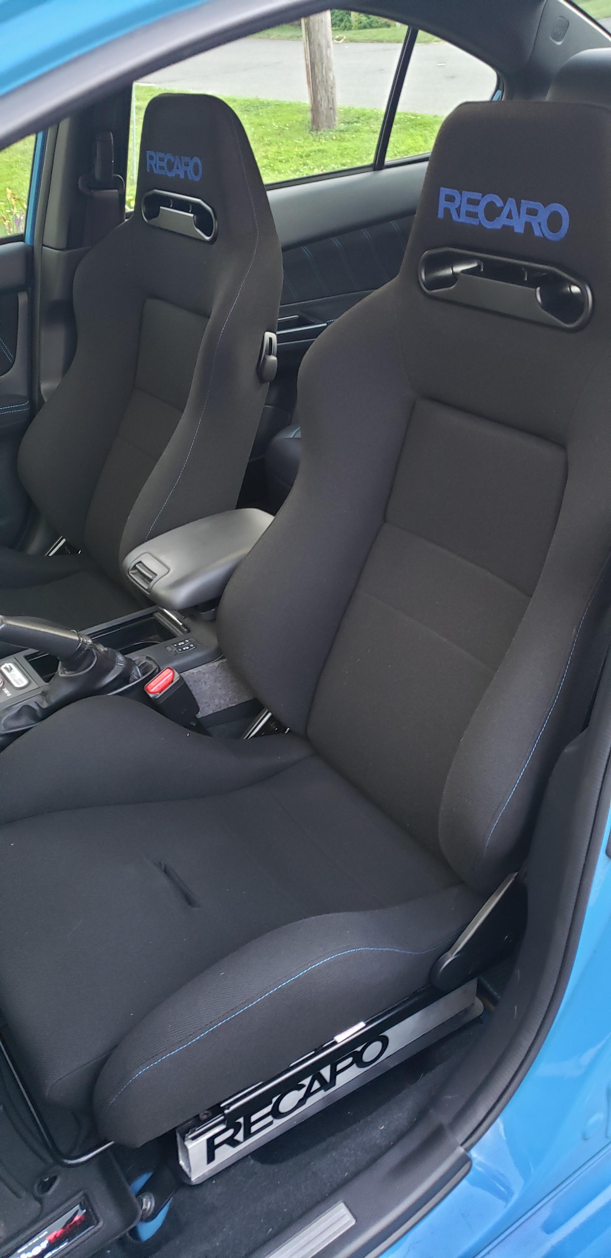 The new seats match so well they look like they could be OE r/WRX