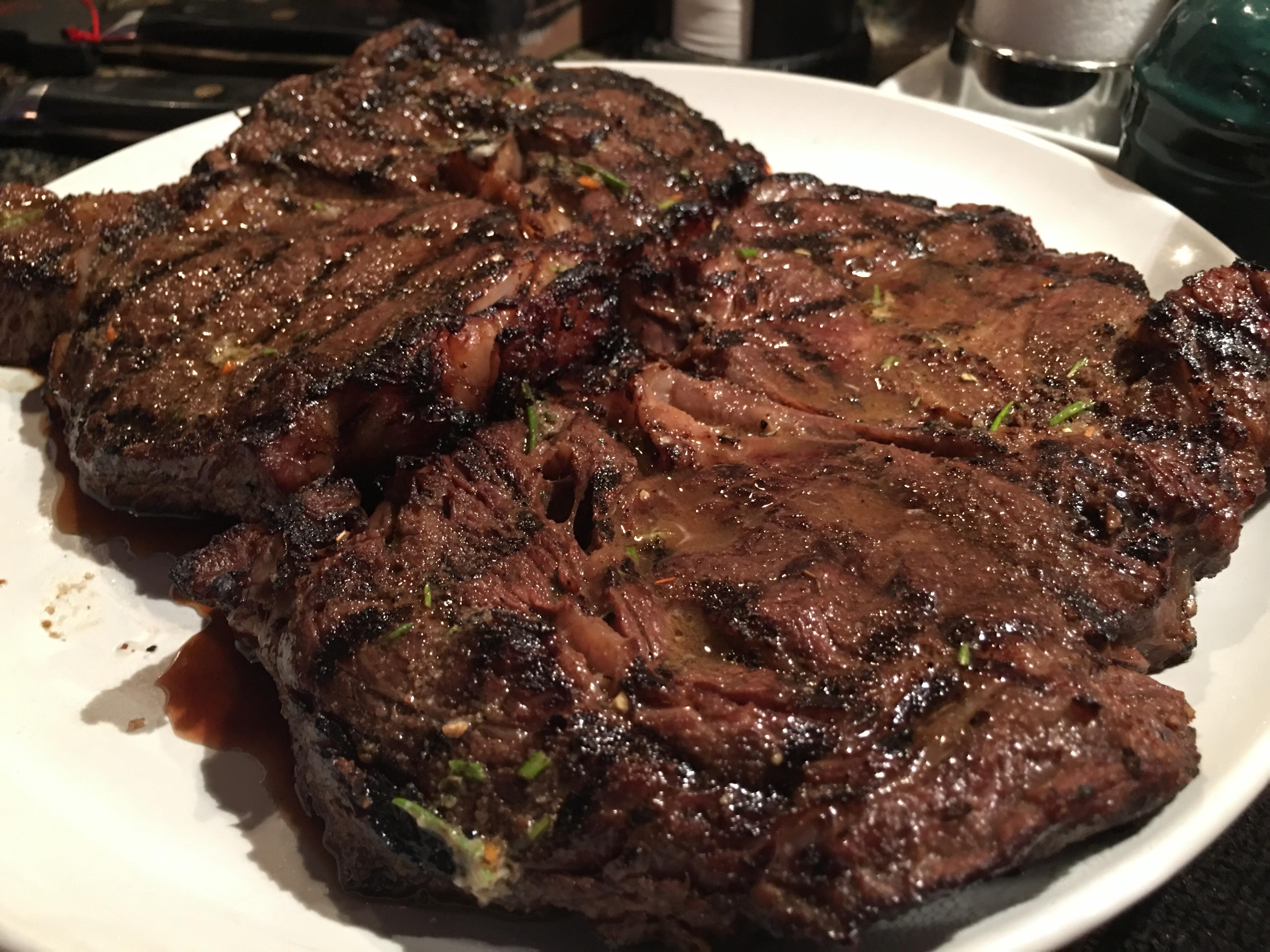 Delmonico ribeyes with Kerry Gold herb butter. Sous vide at 125 for 2