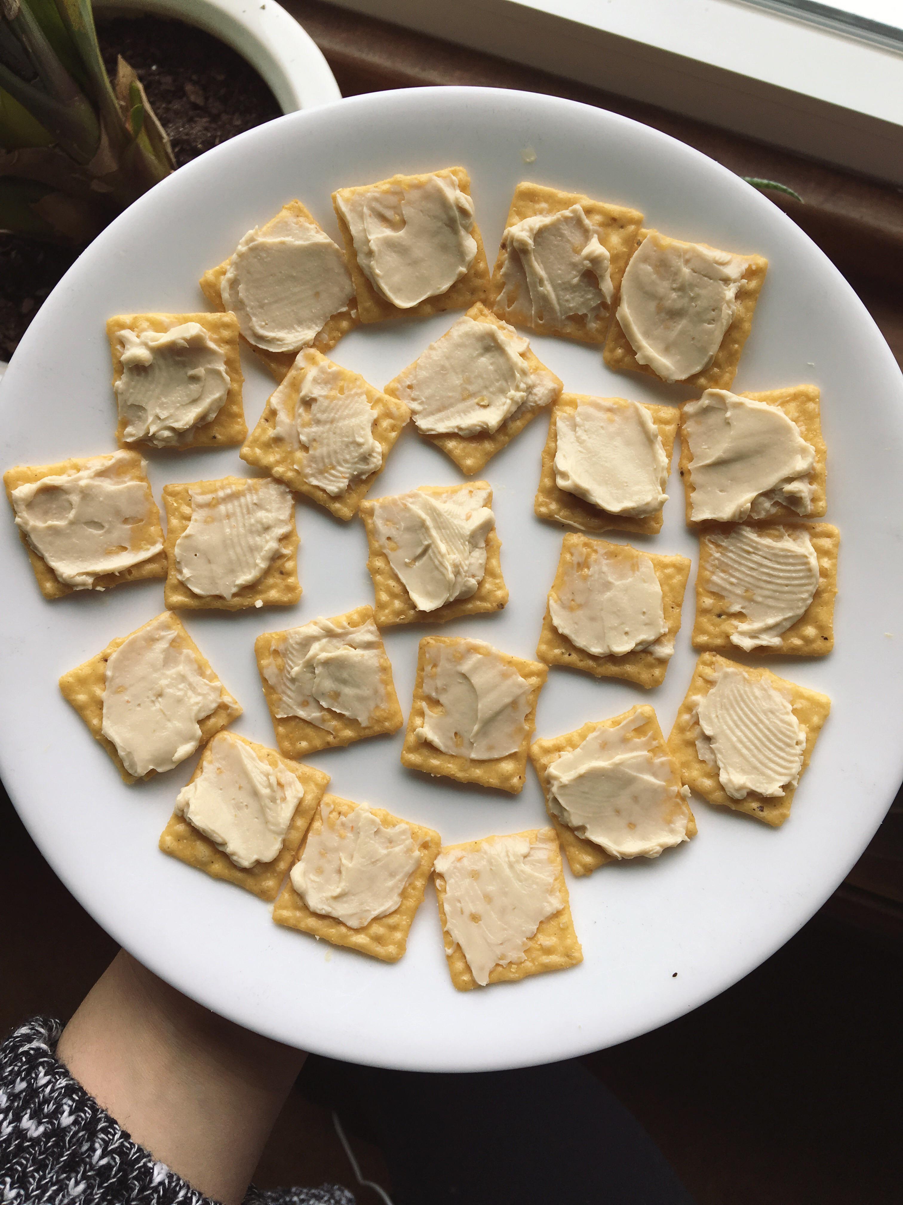 Good Thins crackers and Laughing Cow pepperjack cheese (98 calories
