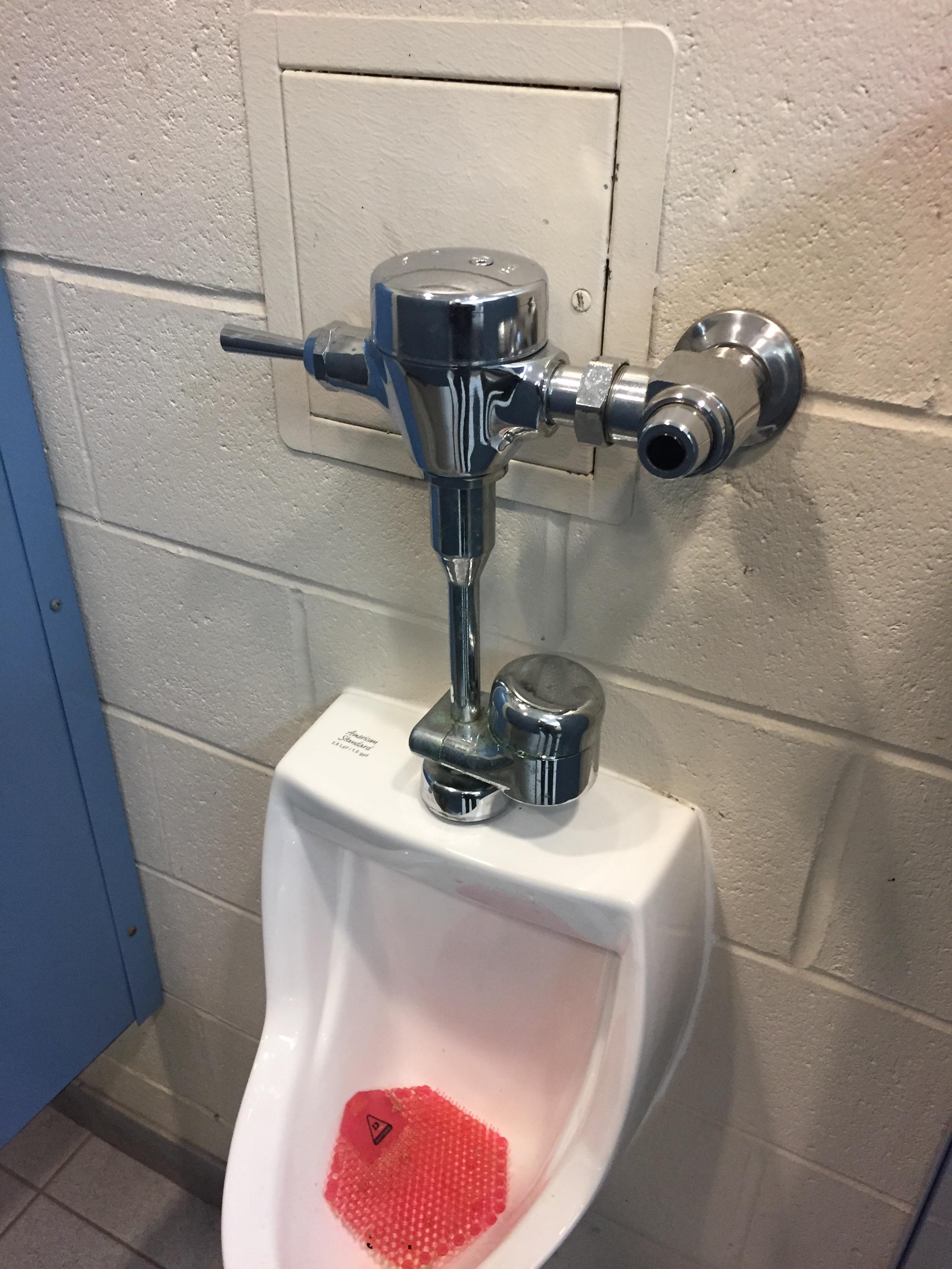 Crappy design. Can’t open the panel behind urinal to get to the water