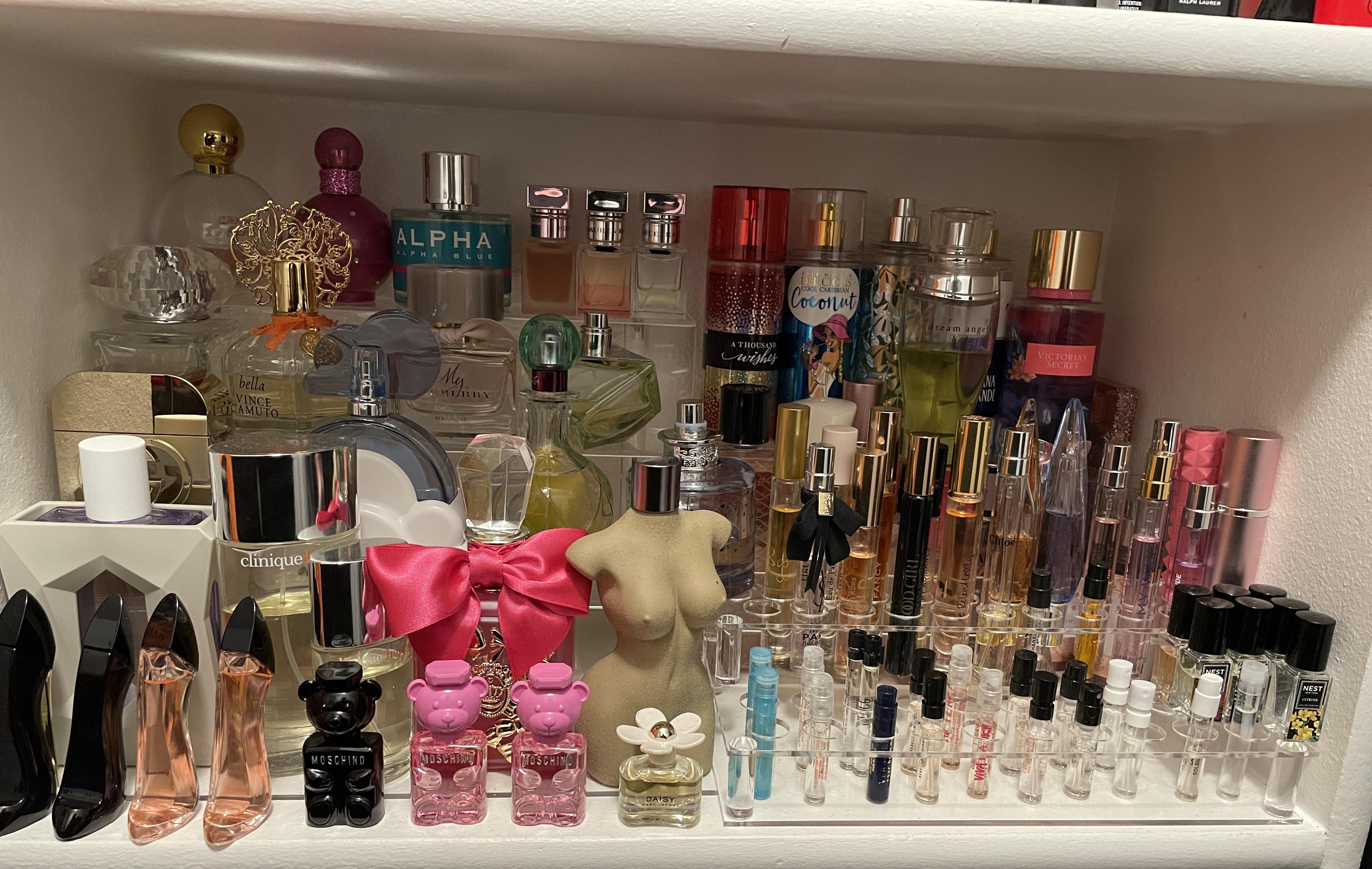 My girl’s (36F) perfume section in our closet. r/mildlyinteresting