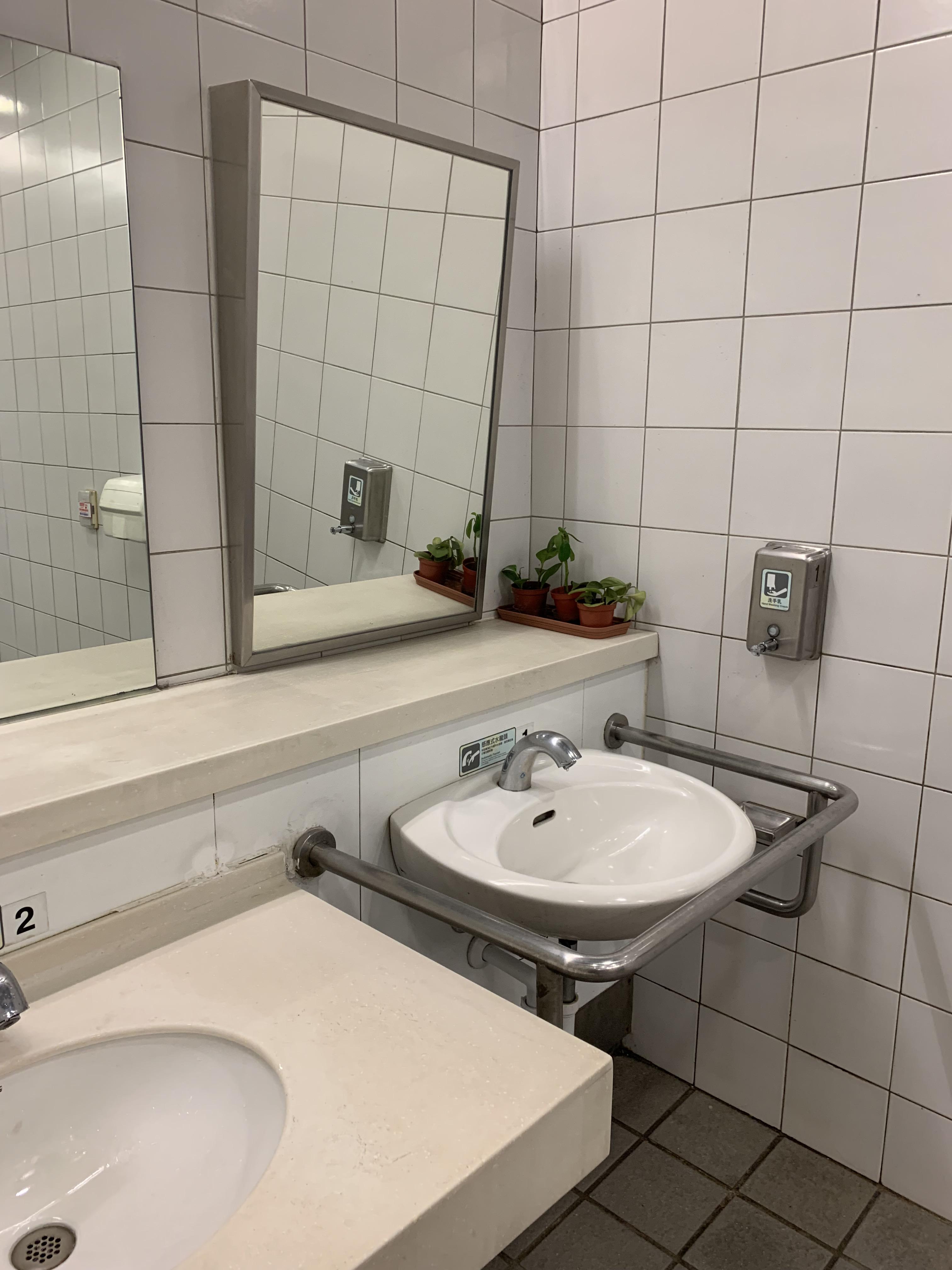 This sink and tilted mirror is perfectly adapted to a help a disabled