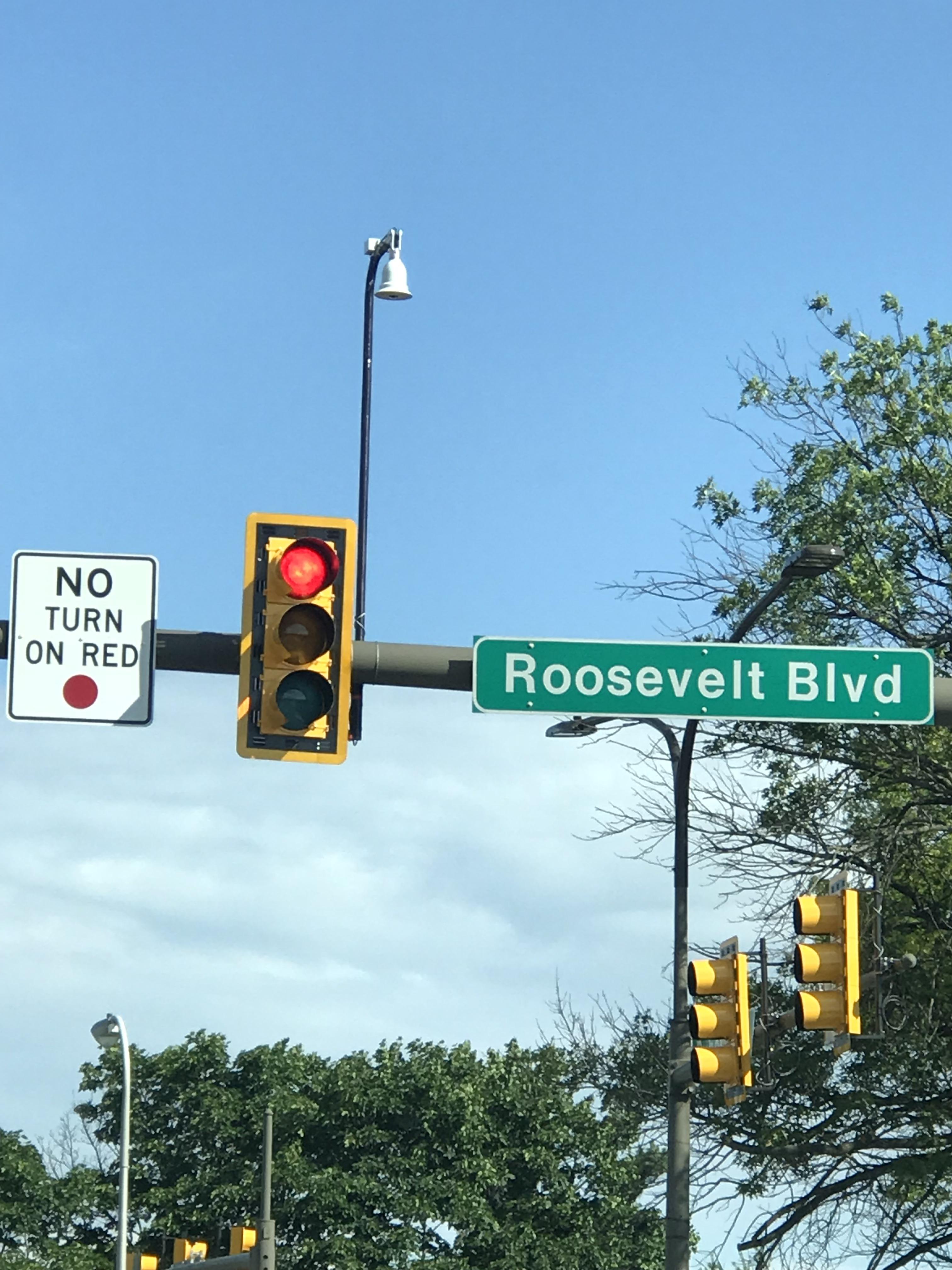 This bell looking thing that they installed over the stop light signal