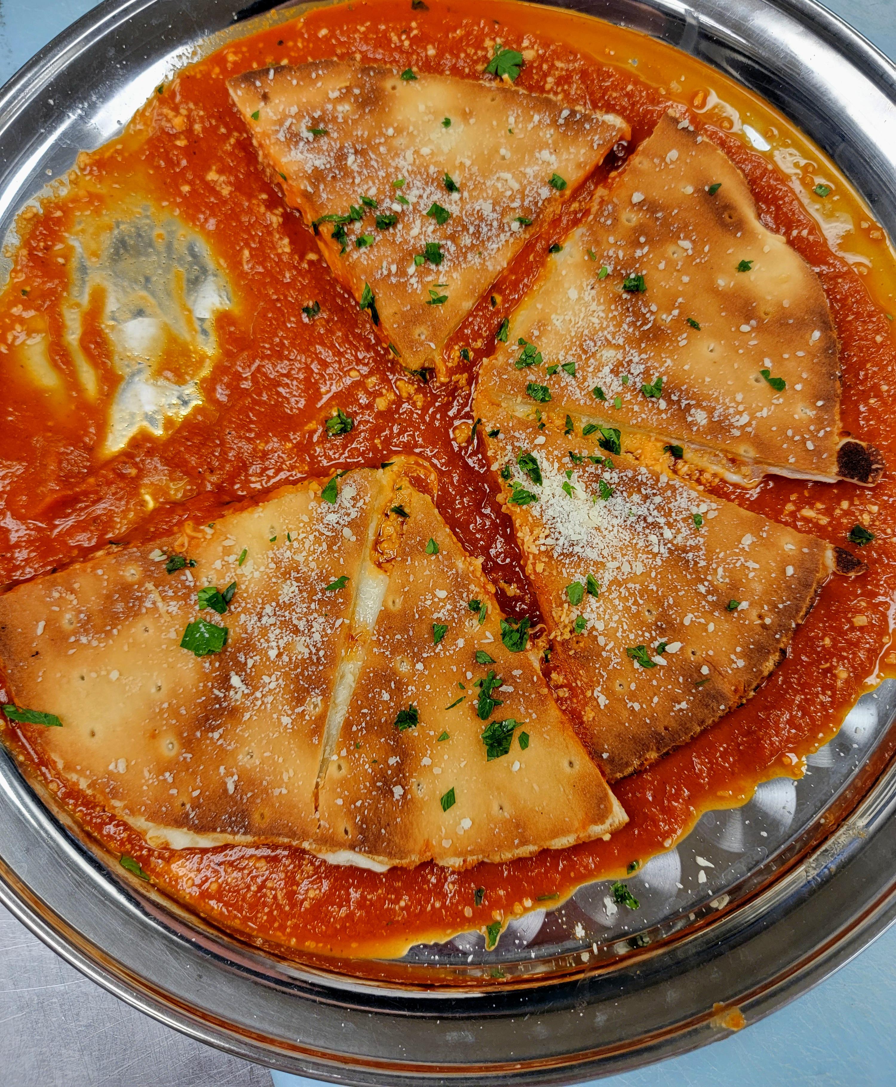 Sauce bottom pizza. The sauce is on the bottom so it hits your flavor