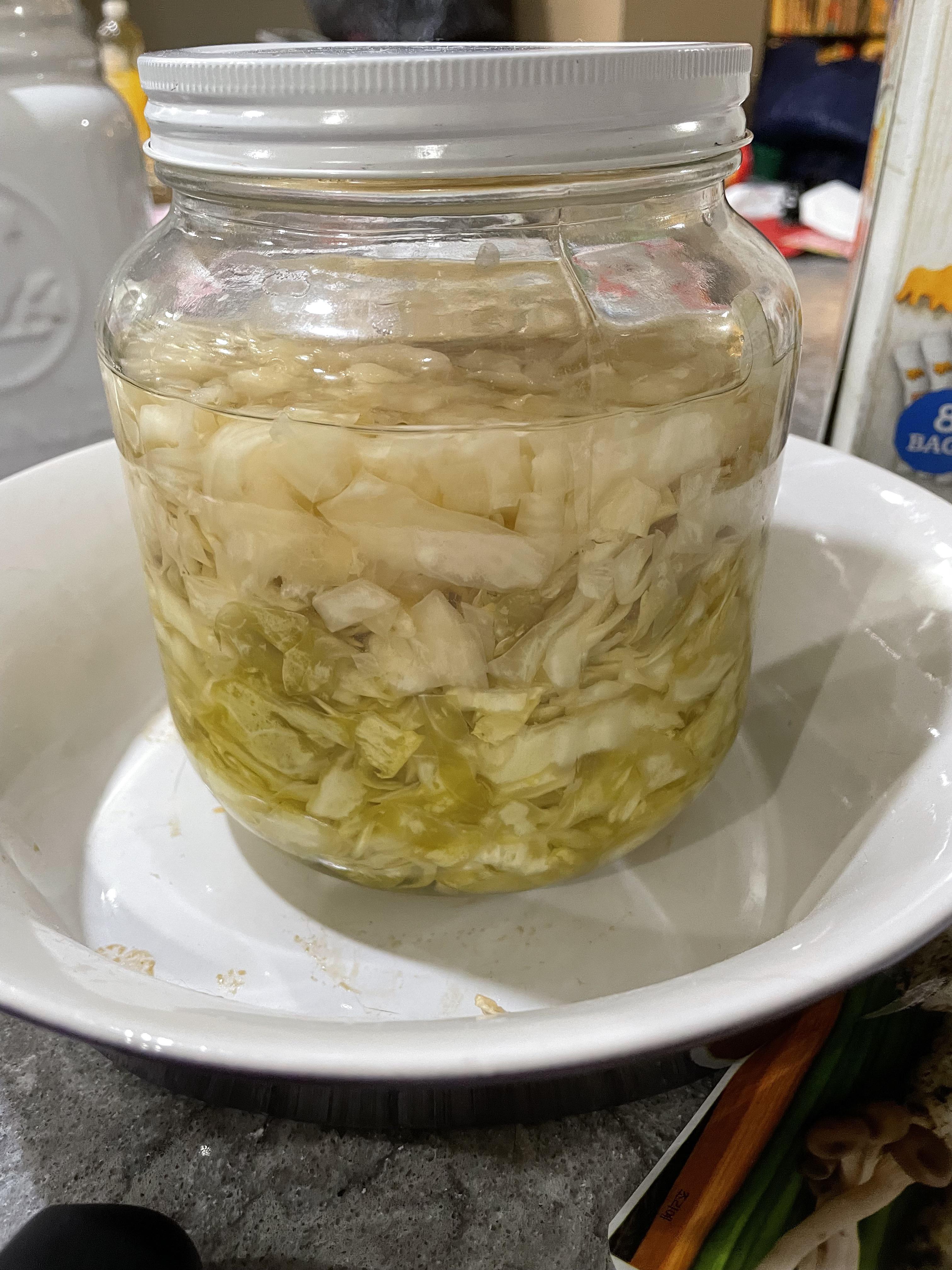 Sauerkraut gone grey? Smells weird and the grey is creeping down over