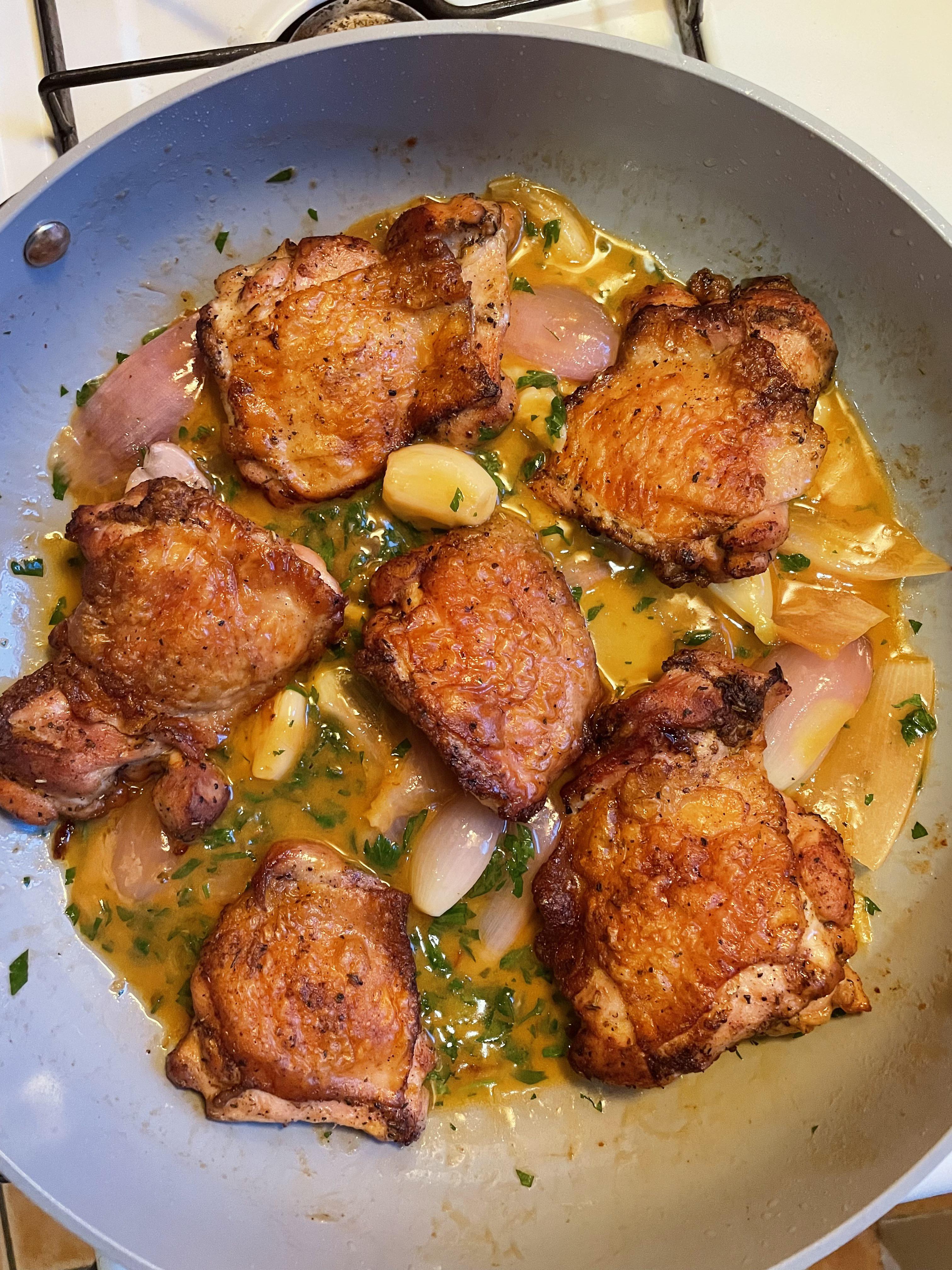 Crispy chicken thighs in a garlic, shallot, parsley and lemon pan sauce