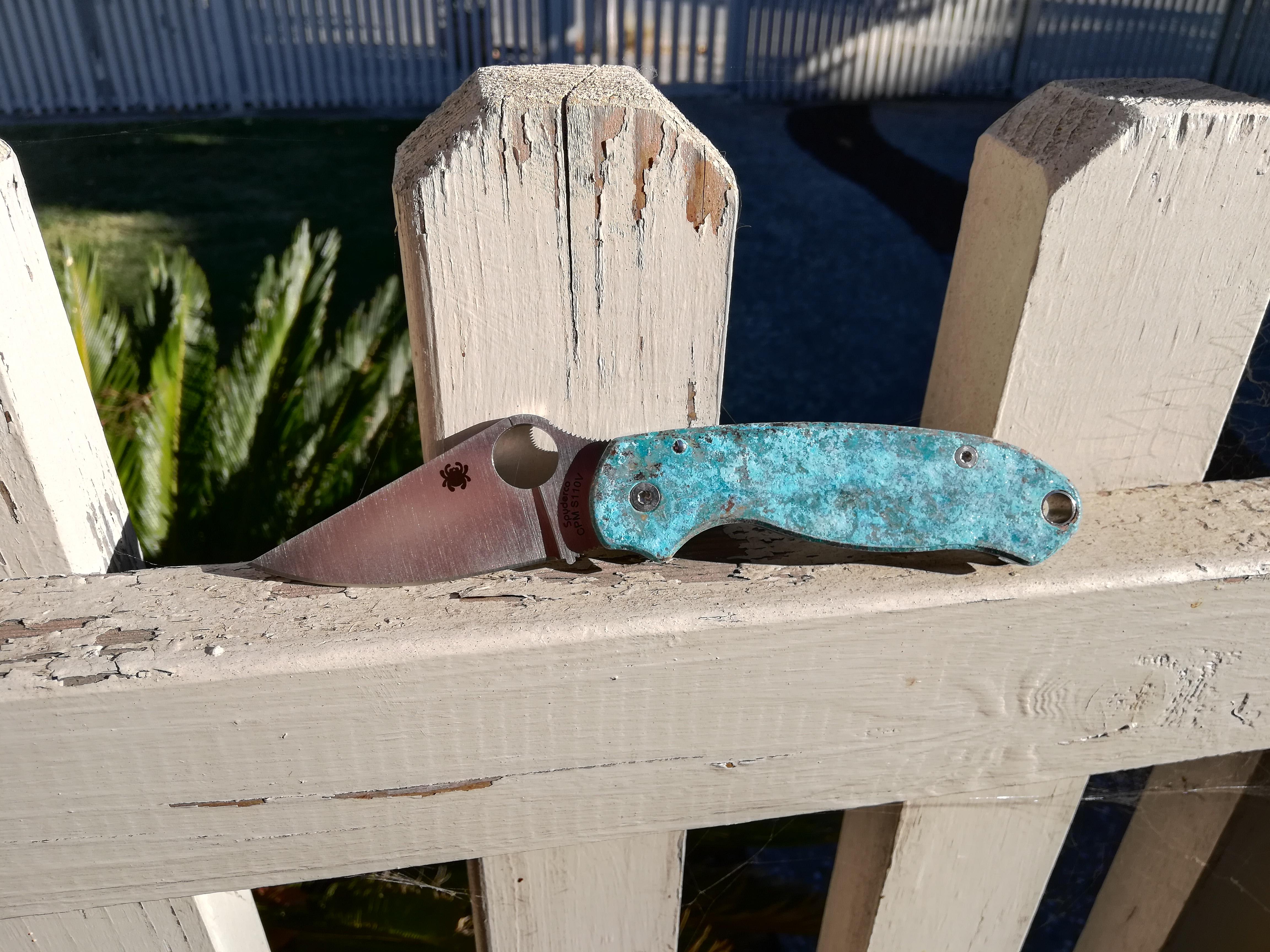 Para 3 S110V Flytanium brass scales with a forced patina.
