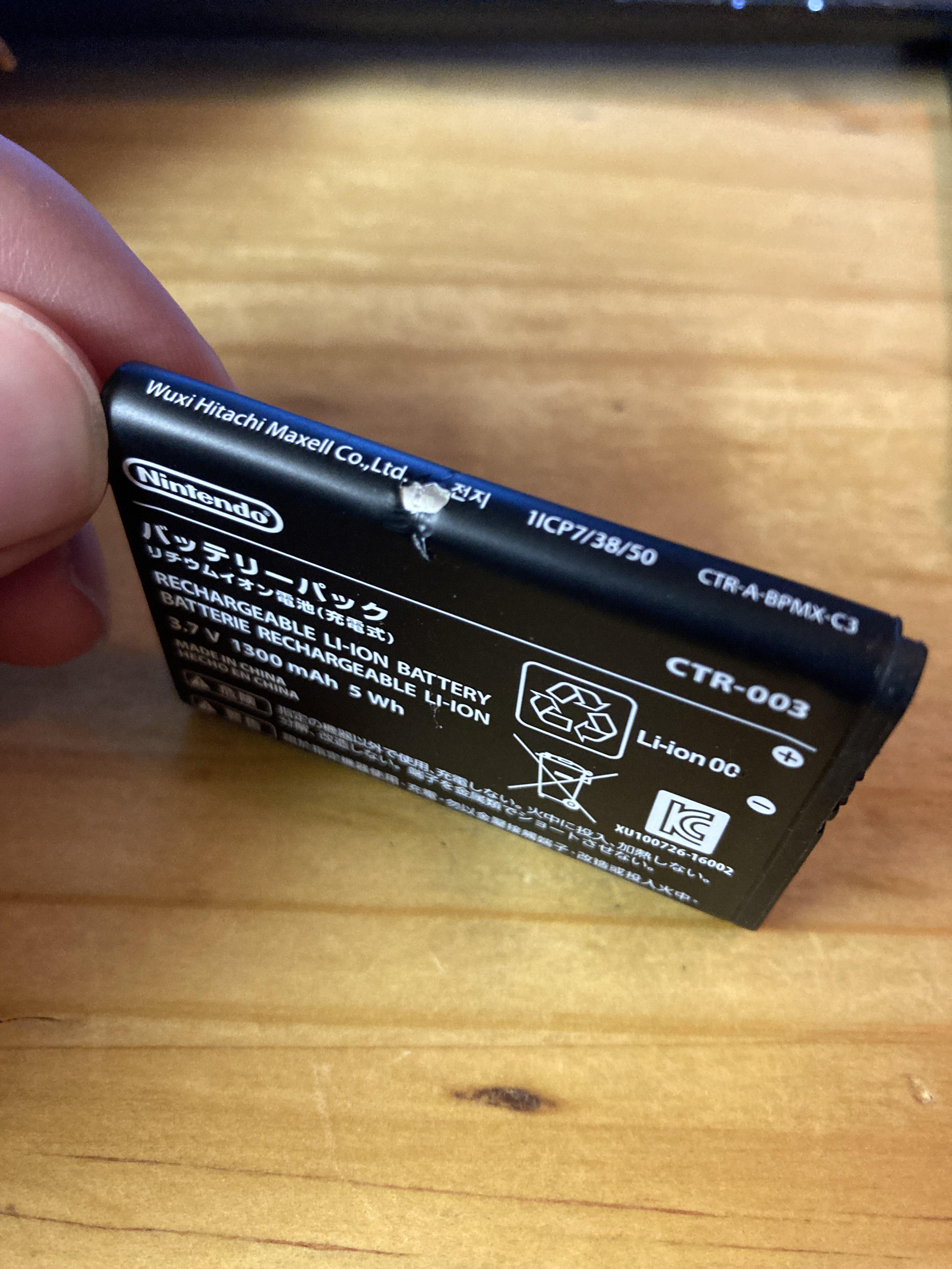 Bought a replacement 3ds battery; is this harmless surface damage, or