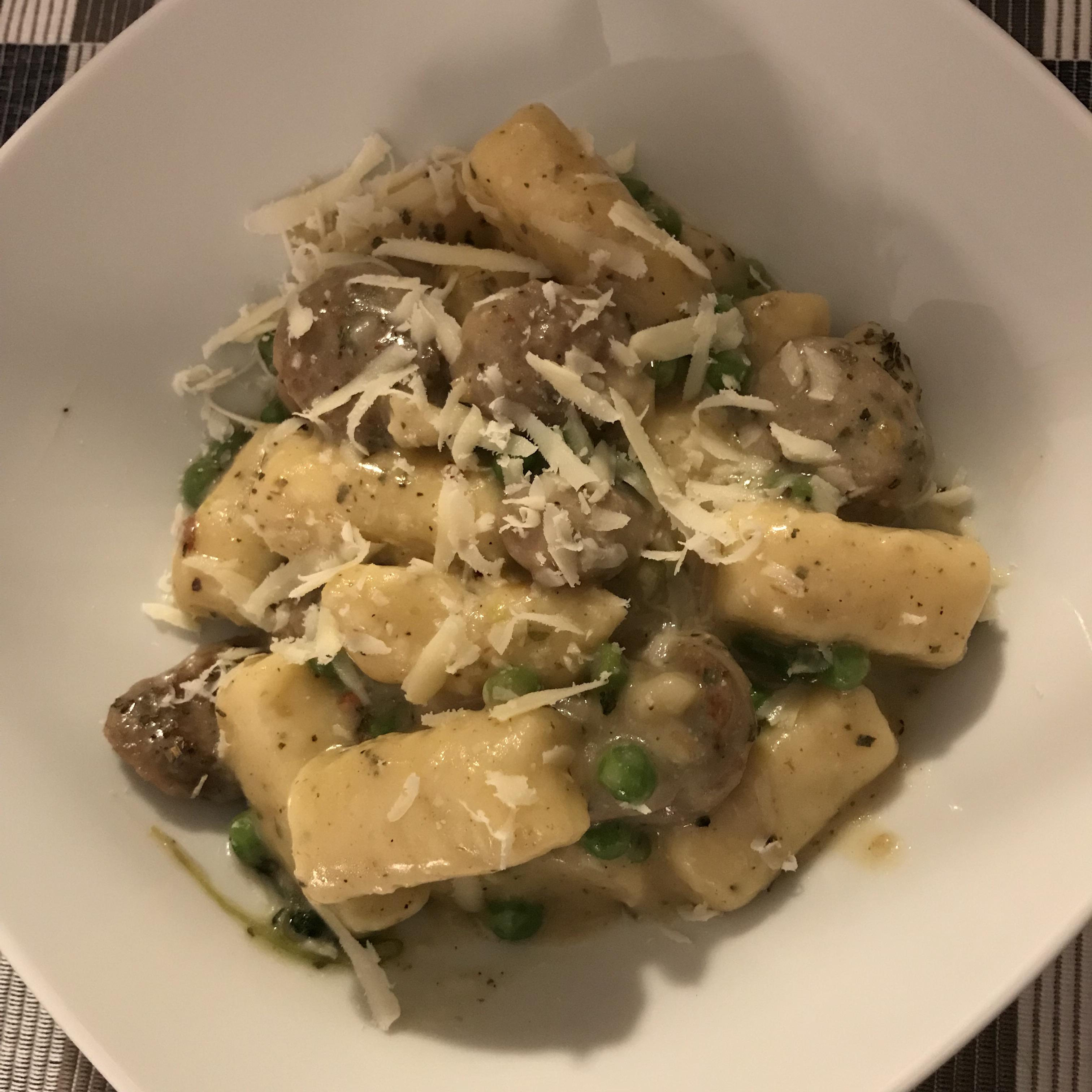 [homemade]potato gnocchi with sausage,peas and a basil mozzarella sauce r/tonightsdinner