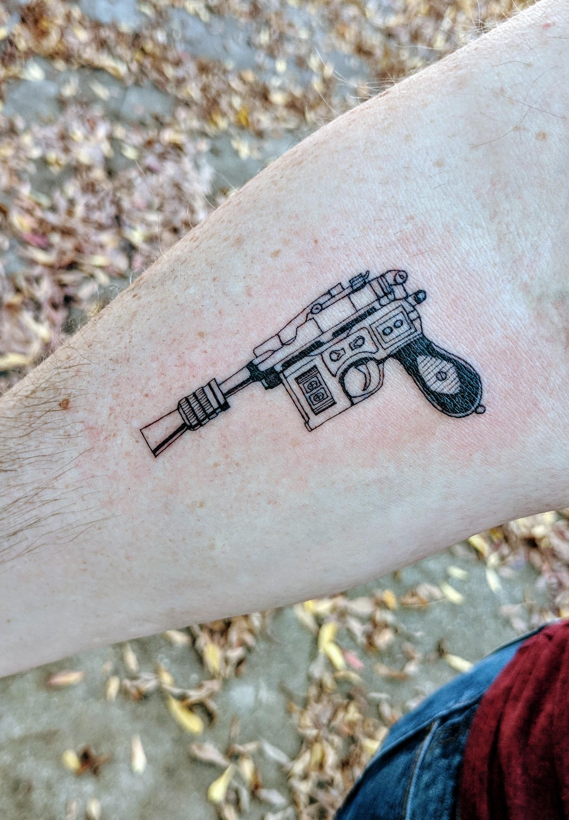 Han Solo's blaster from ESB inked by Ralph Madrid at Sacred Wave