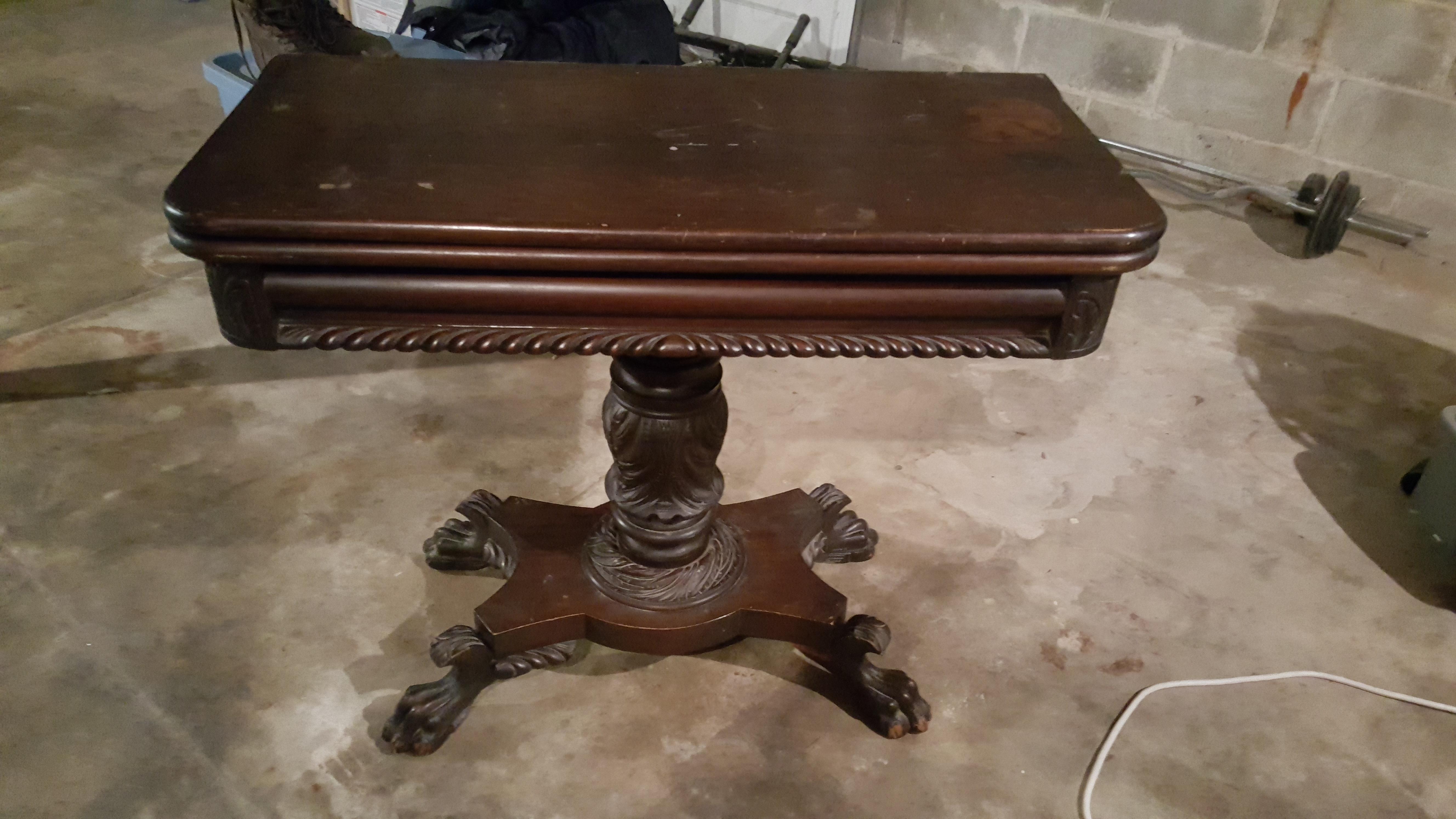 Old flip top table. Anyone help me with any information on what it is