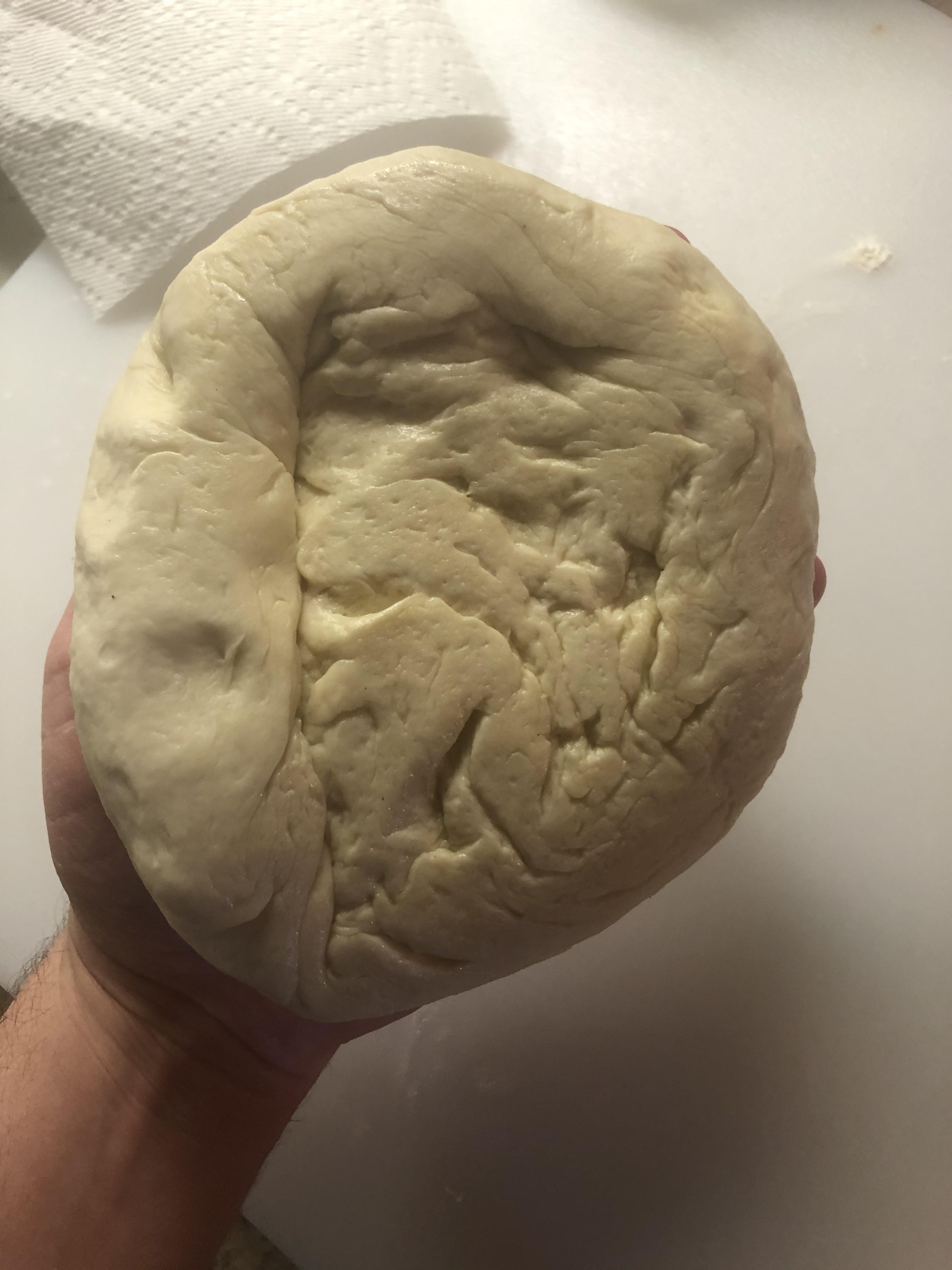 Why does my pizza dough look like this after cold ferment in fridge
