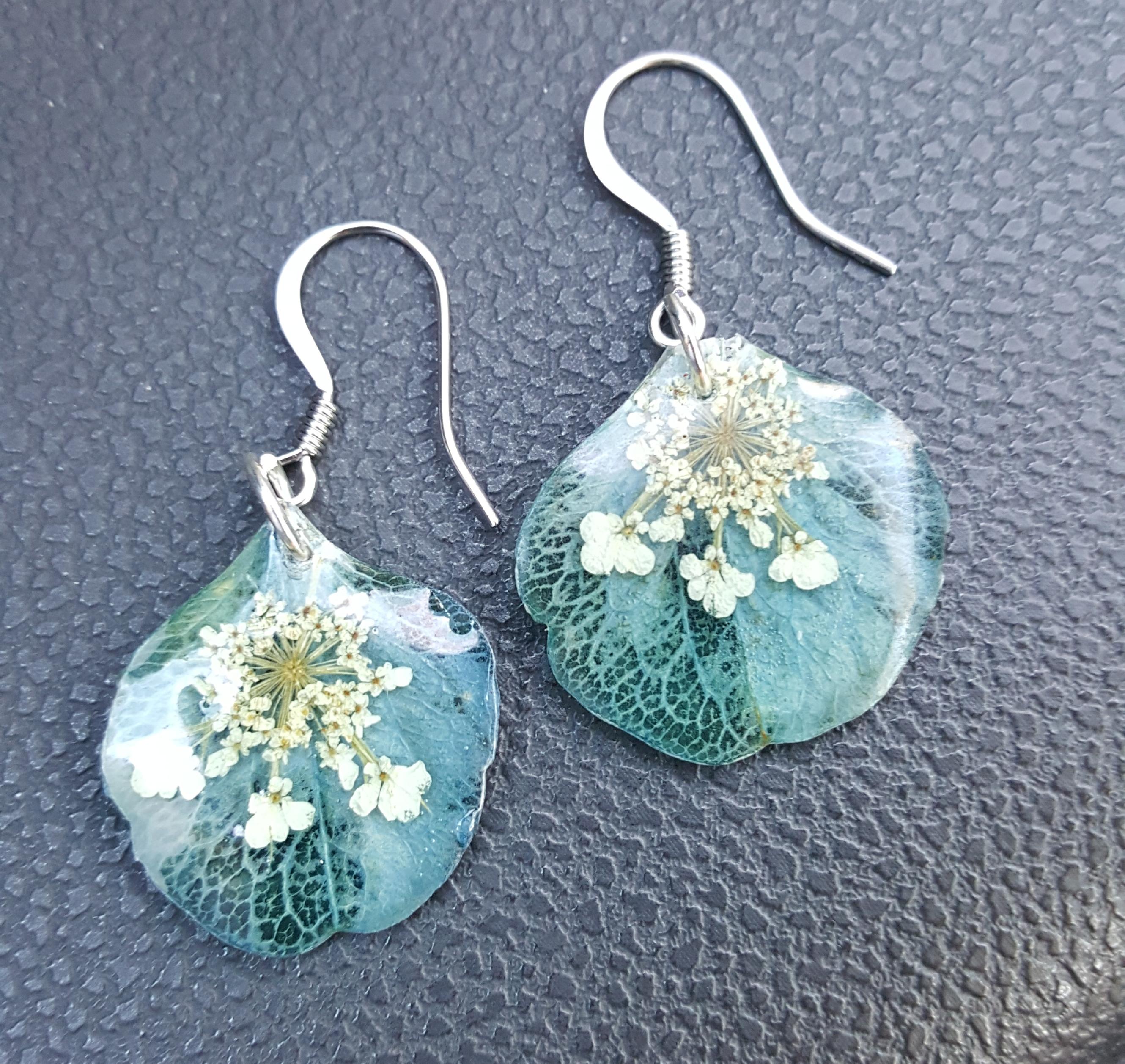A pair of earrings I made using single hydrangea petals layered with