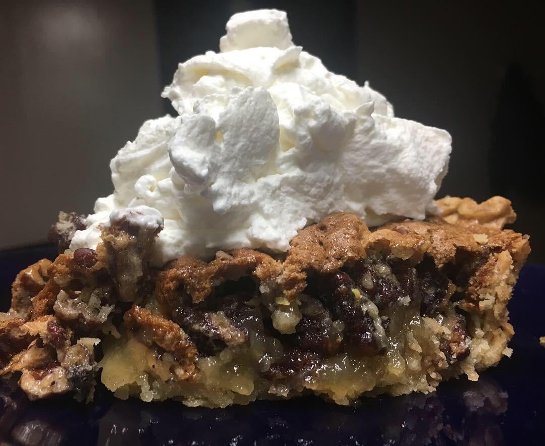 Pecan pie with whipped cream topping. r/FoodPorn