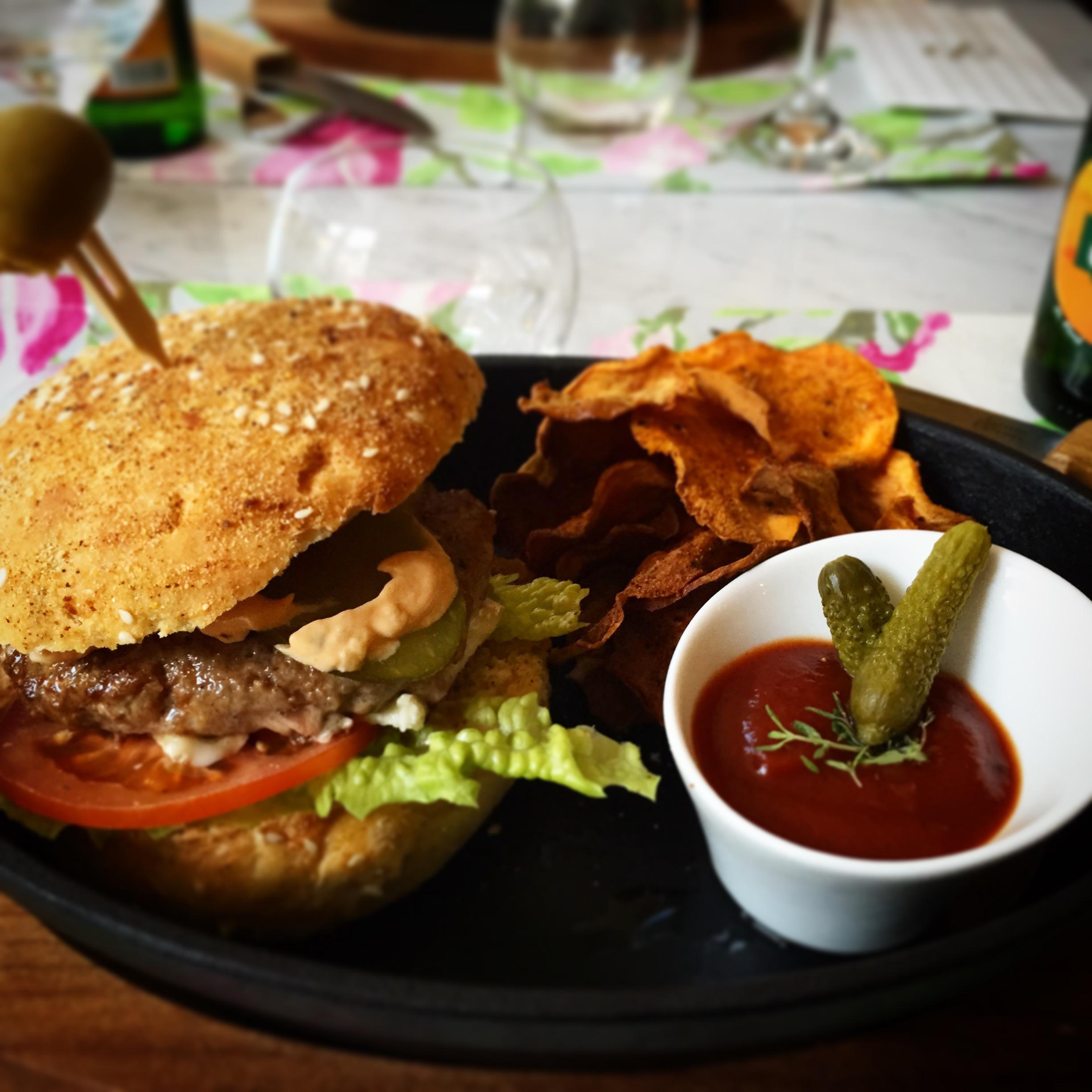 Home made deer burger with home made corn and chili bread, oven fried