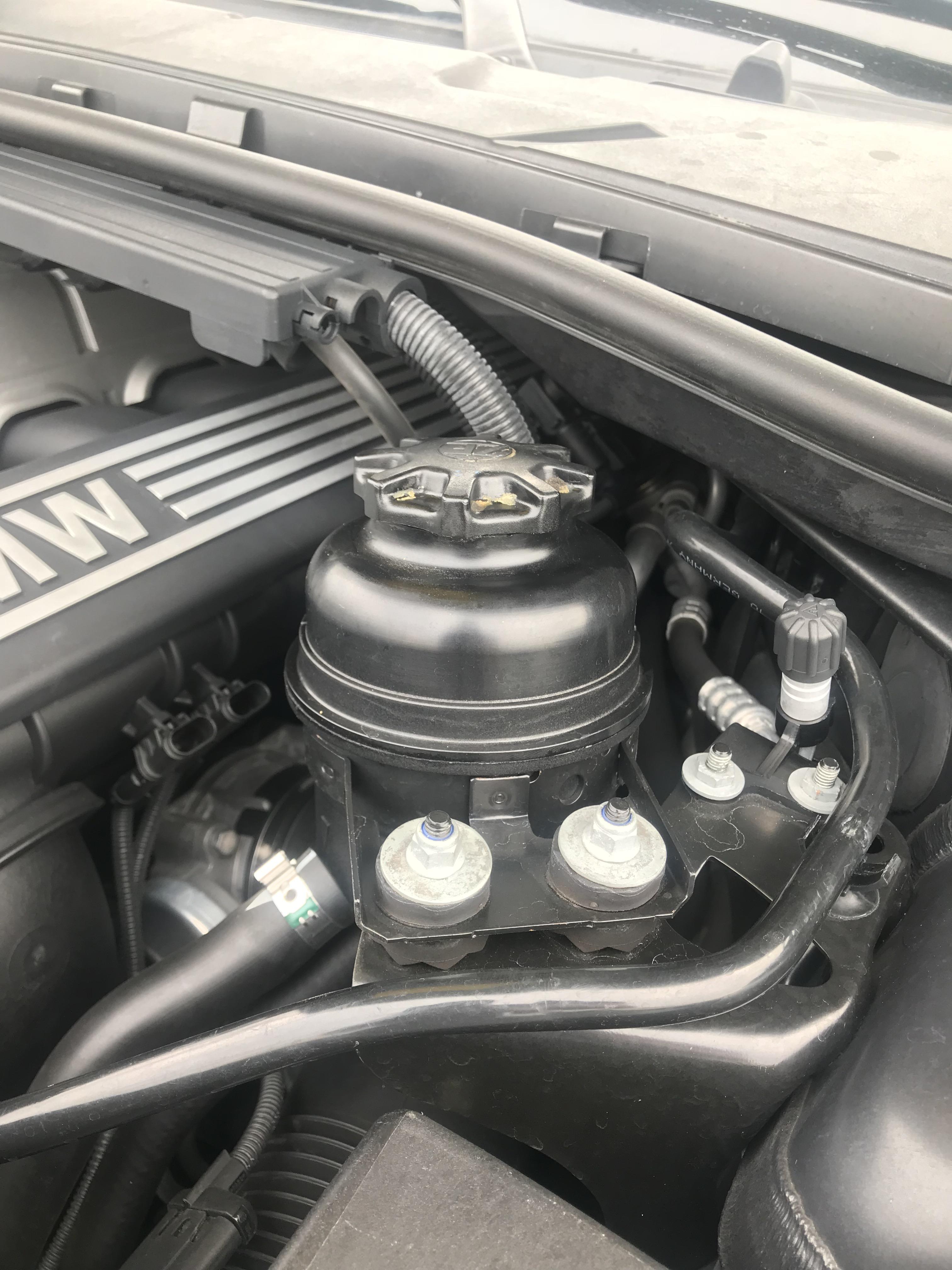 To those of you with E9Xs, an E30 power steering reservoir cap will fit