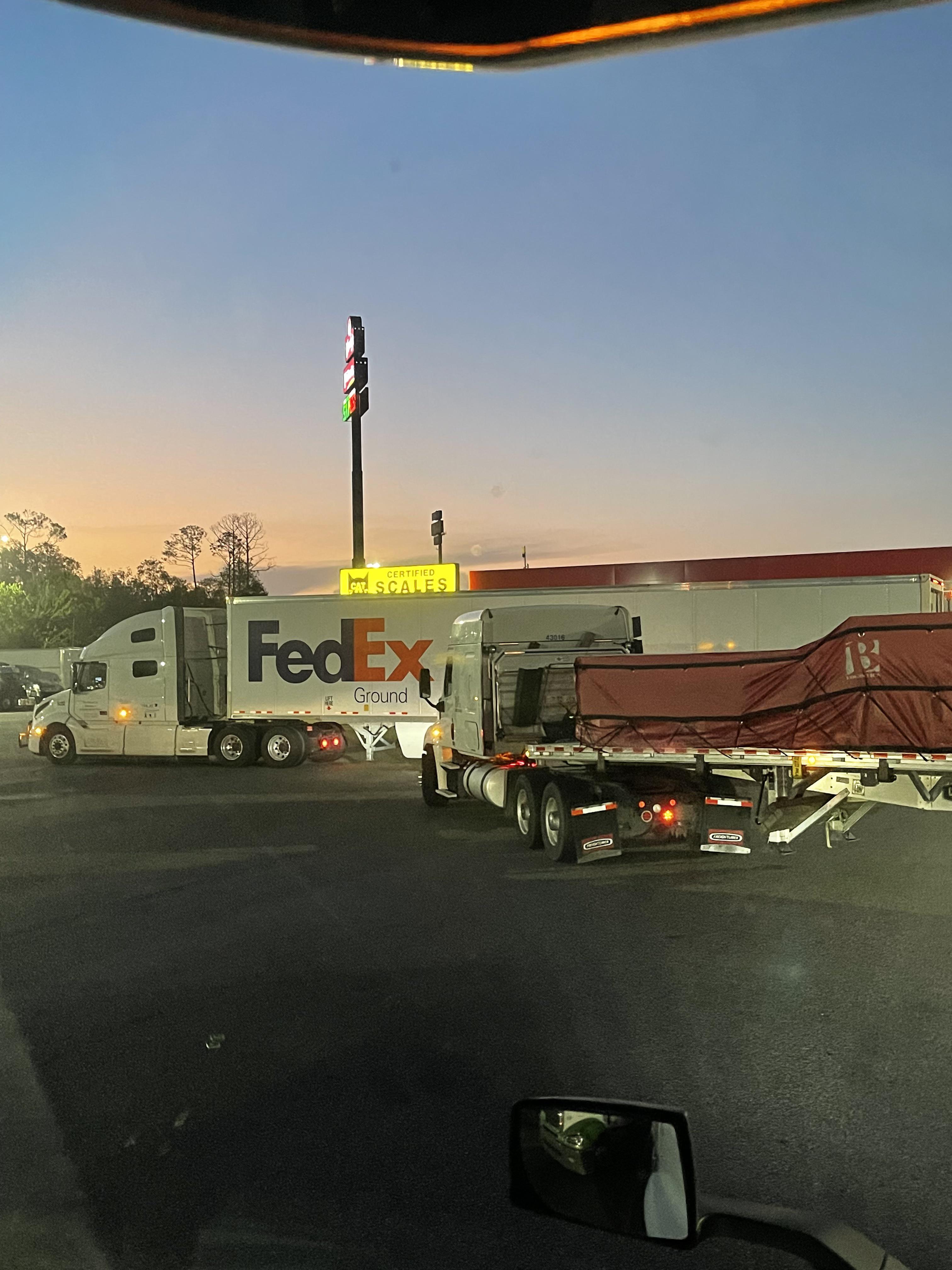 FedEx truck parked at the entrance of the fuel station 🤡 r/Truckers