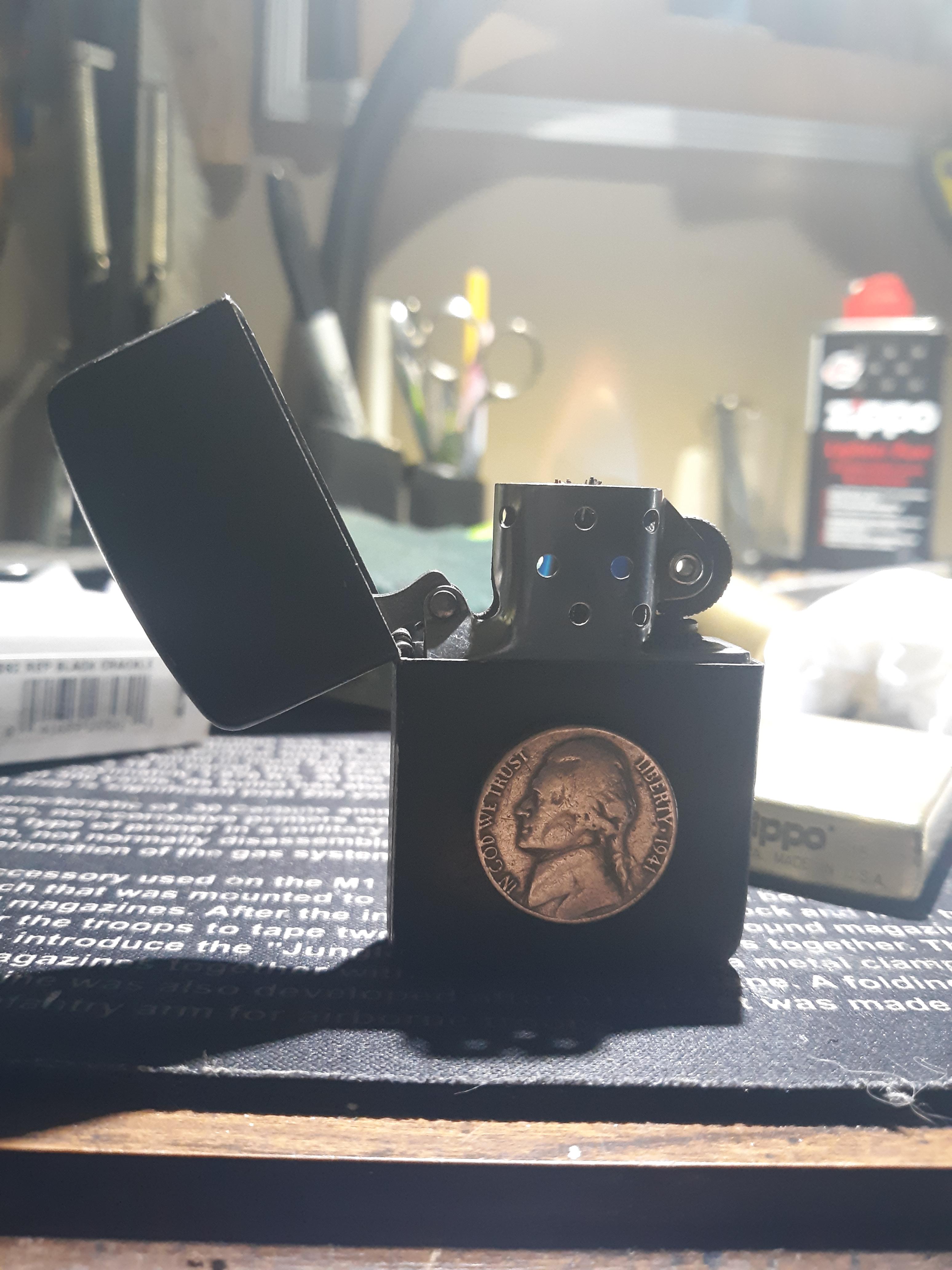 Replica 1941 Black Crackle with a 1941 Nickel adhered to it.... r/Zippo