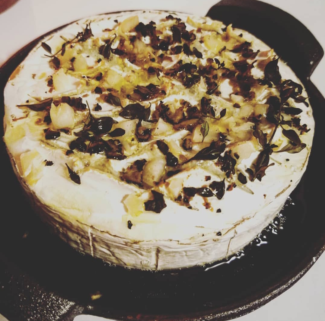 Trying out my new cast iron brie baking dish. Baked brie with shaved