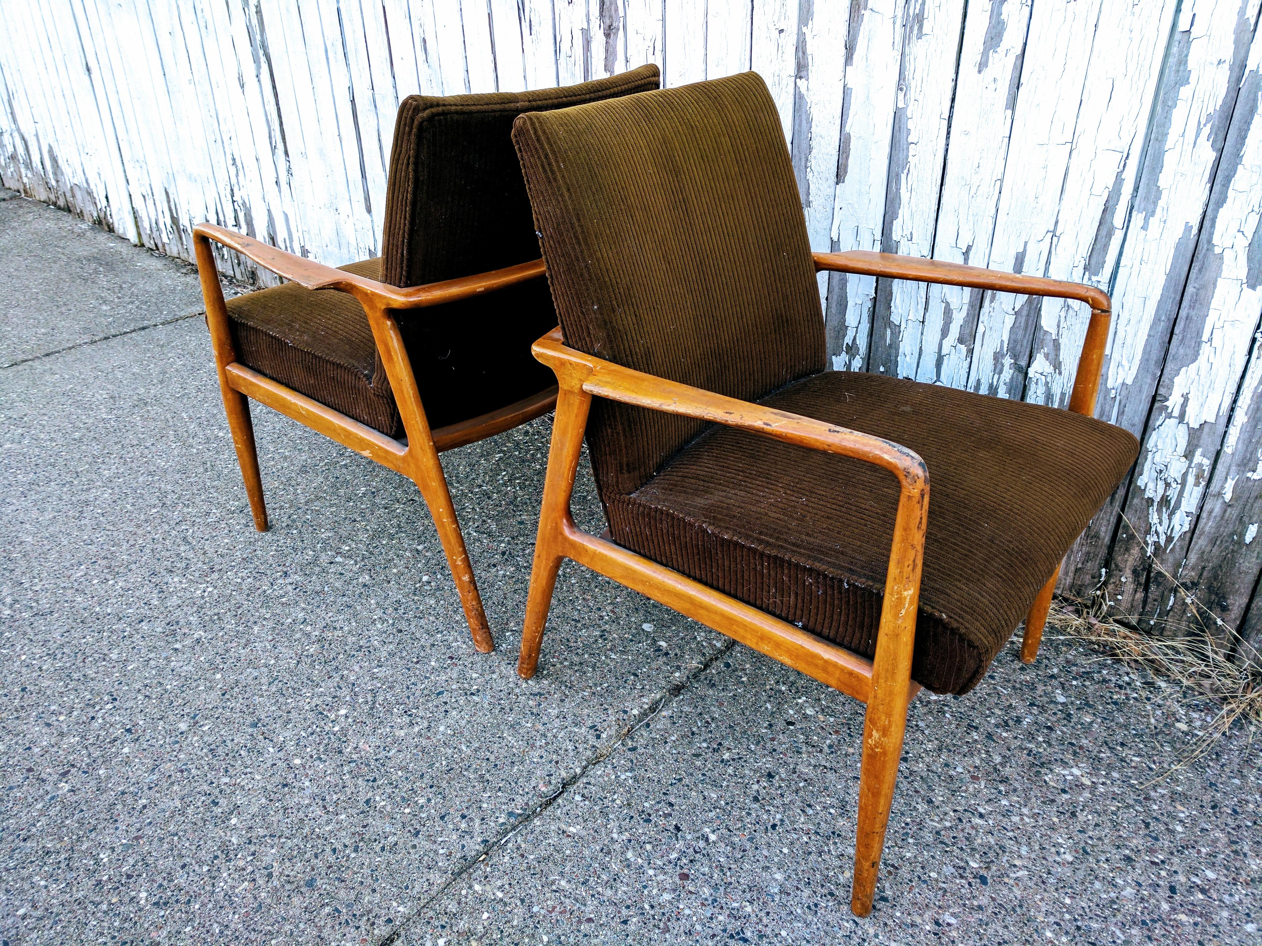 Pair of Mid Century chairs made by Stow & Davis. Sculpted solid walnut