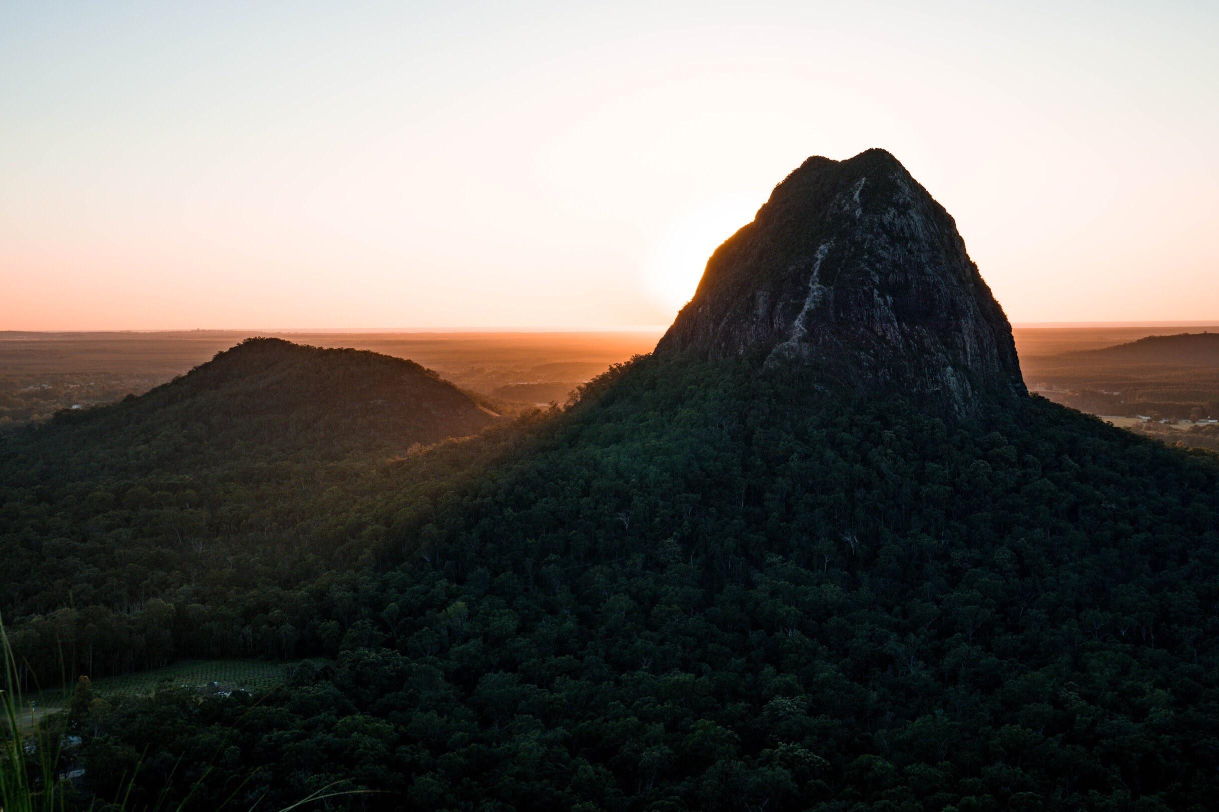 Sunrise hikes for views like this. Glasshouse mountains are great for a