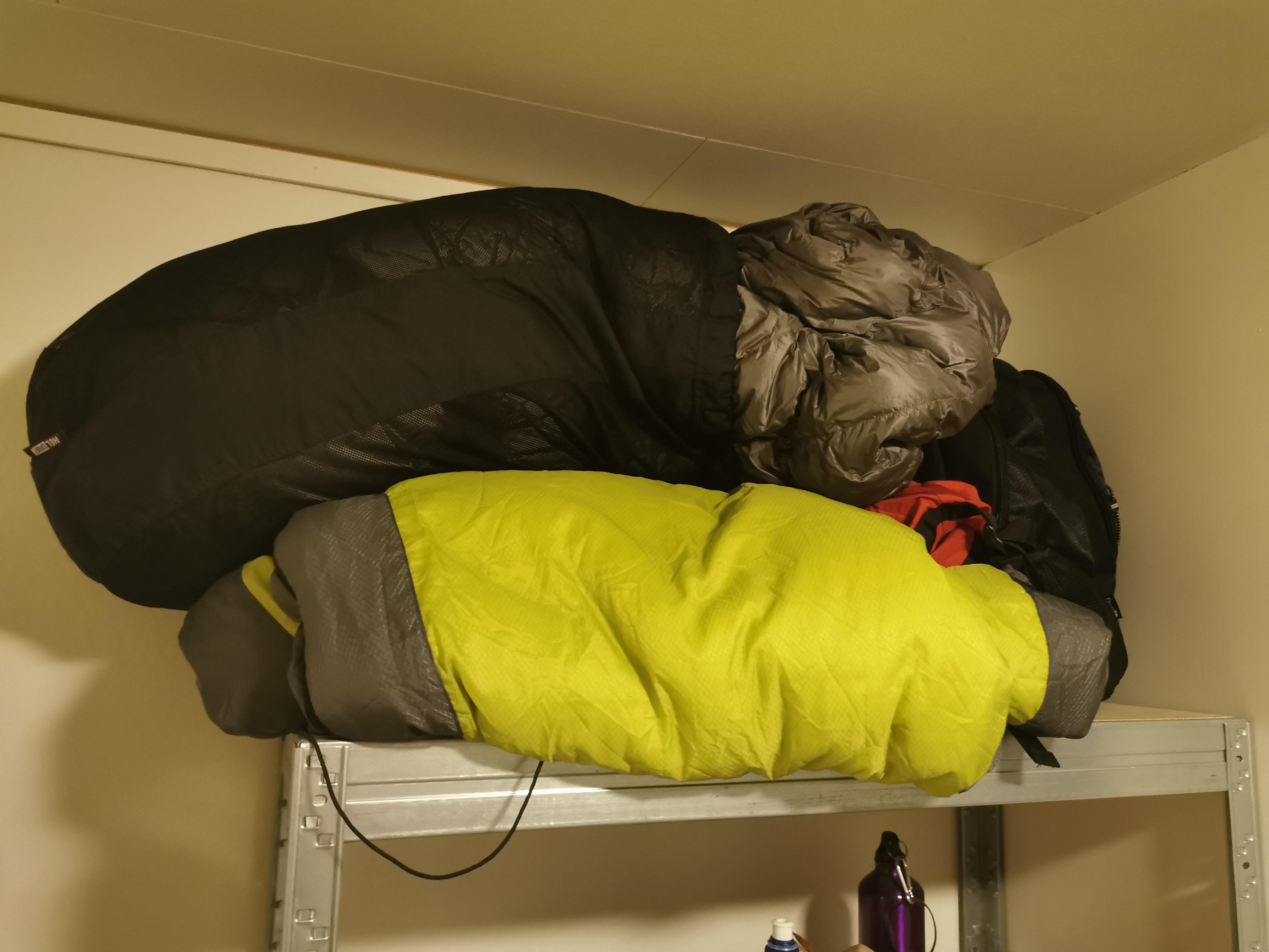 Storing sleeping bags is always weird. No room to hang them, so ended