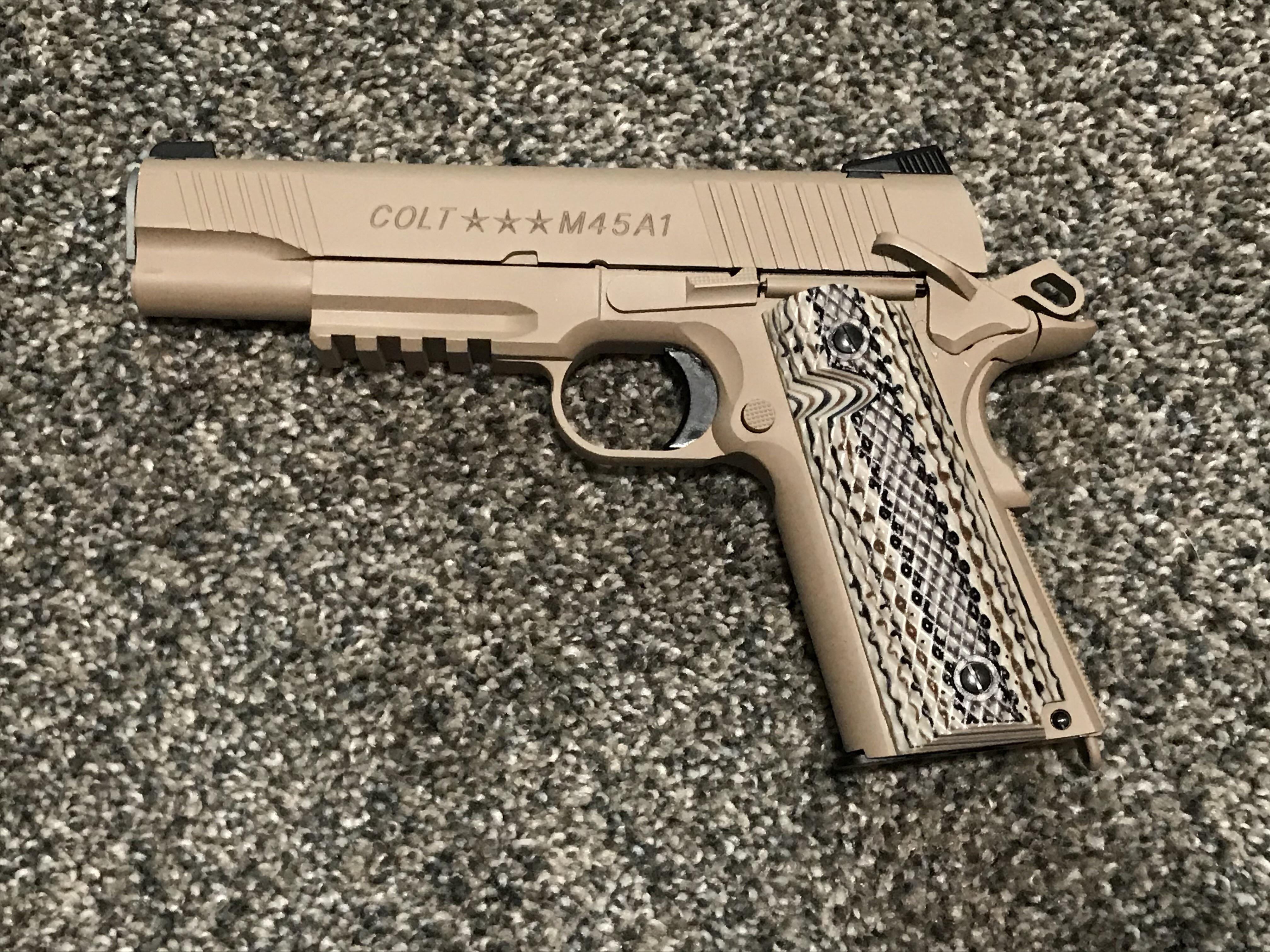 My colt 1911 blowback pistol r/airsoft