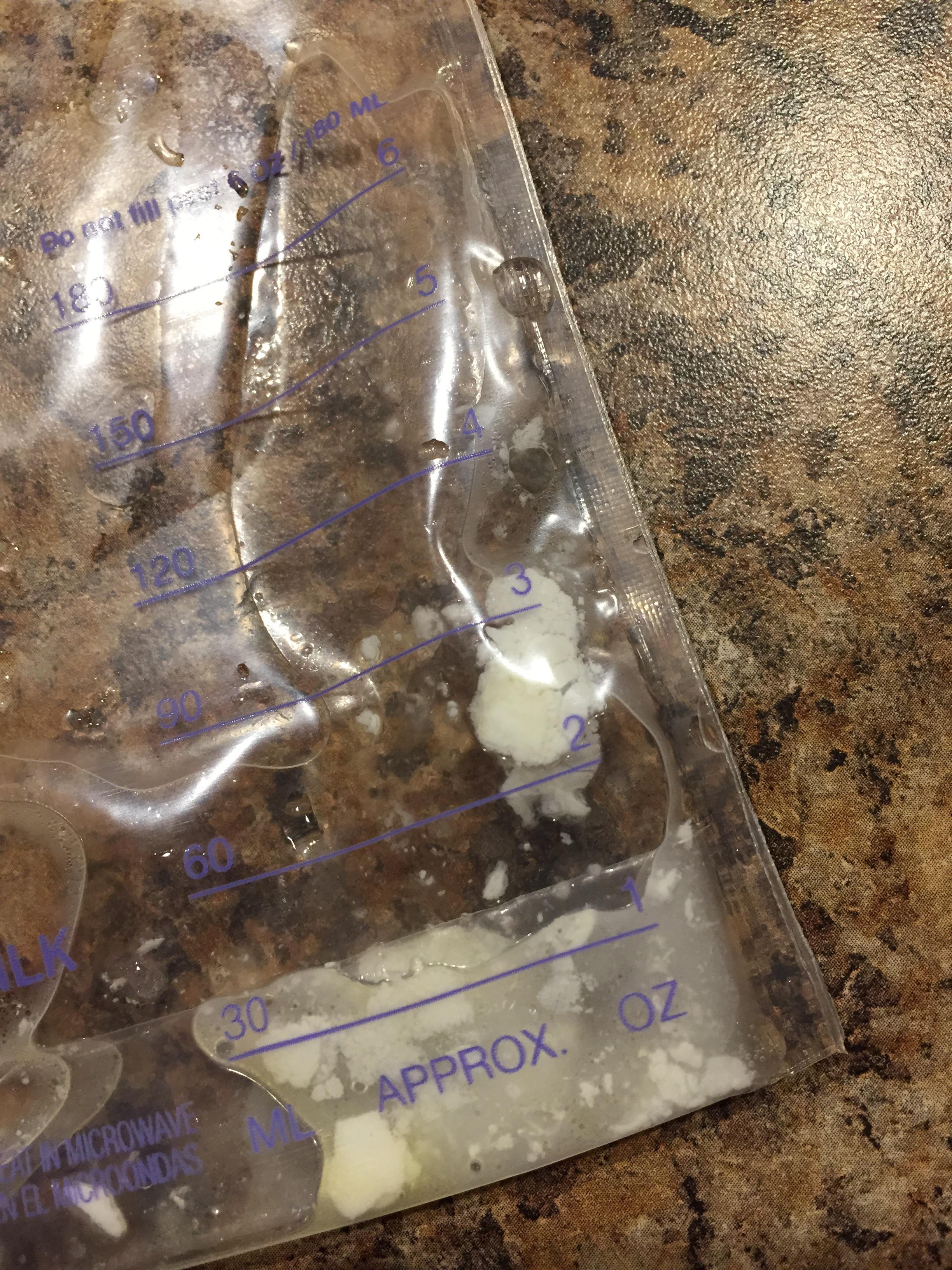 Noticed these weird chunks when pouring thawed milk in a bottle. Is