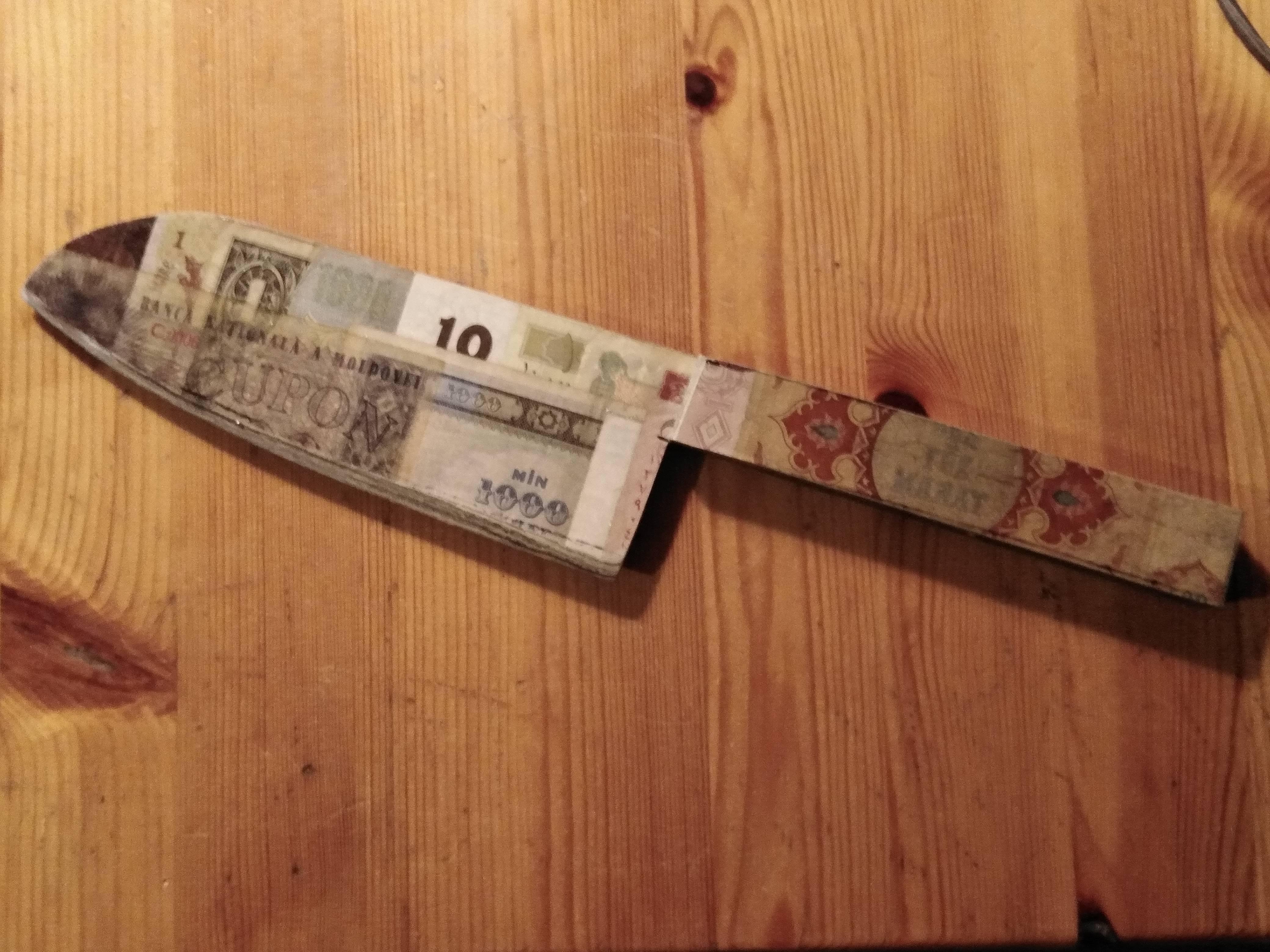 A Knife made of banknotes, most likely the sharpest banknote knife in