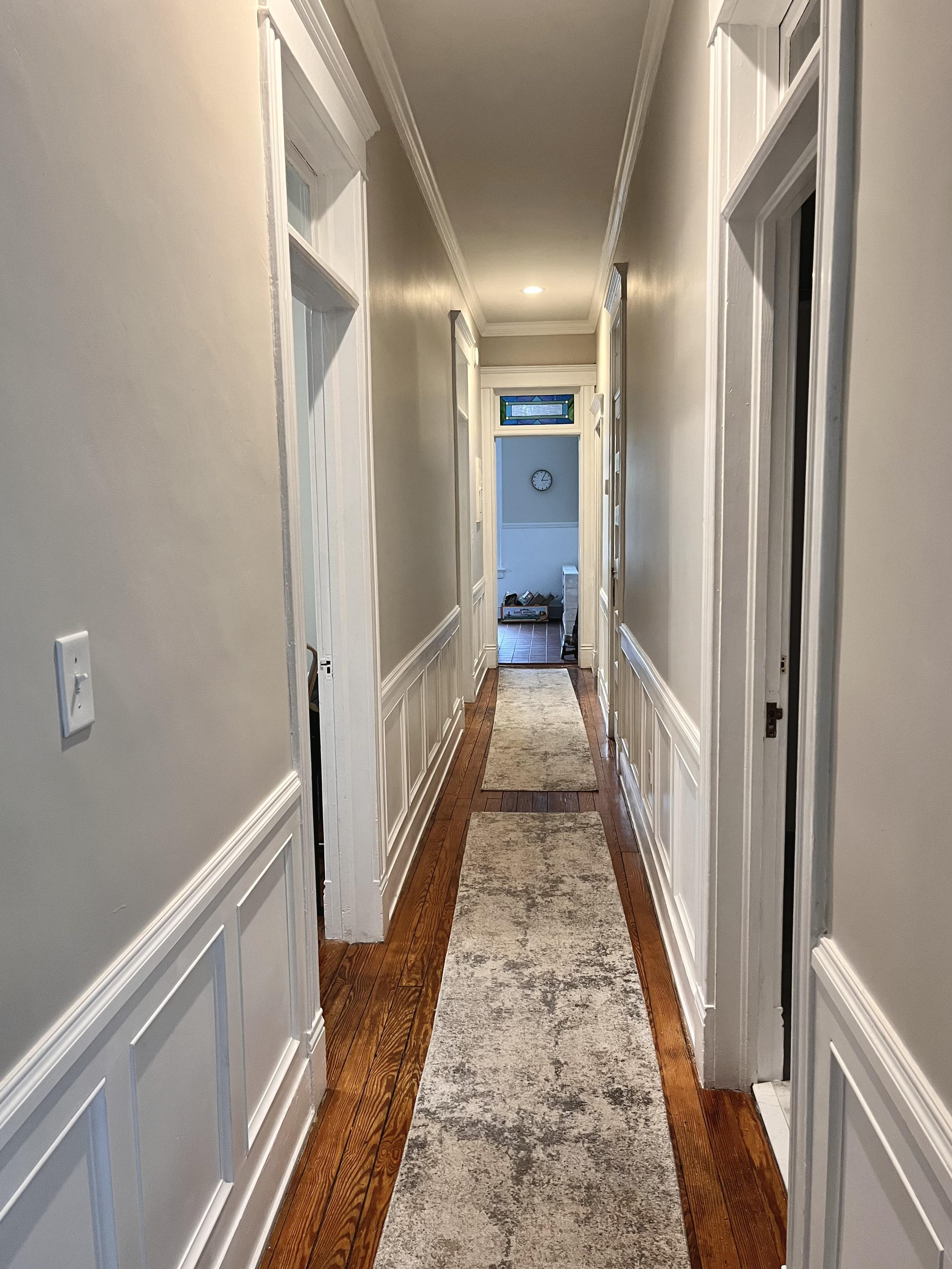 26ftlong, narrow hall. Should I put art on both sides, or just one