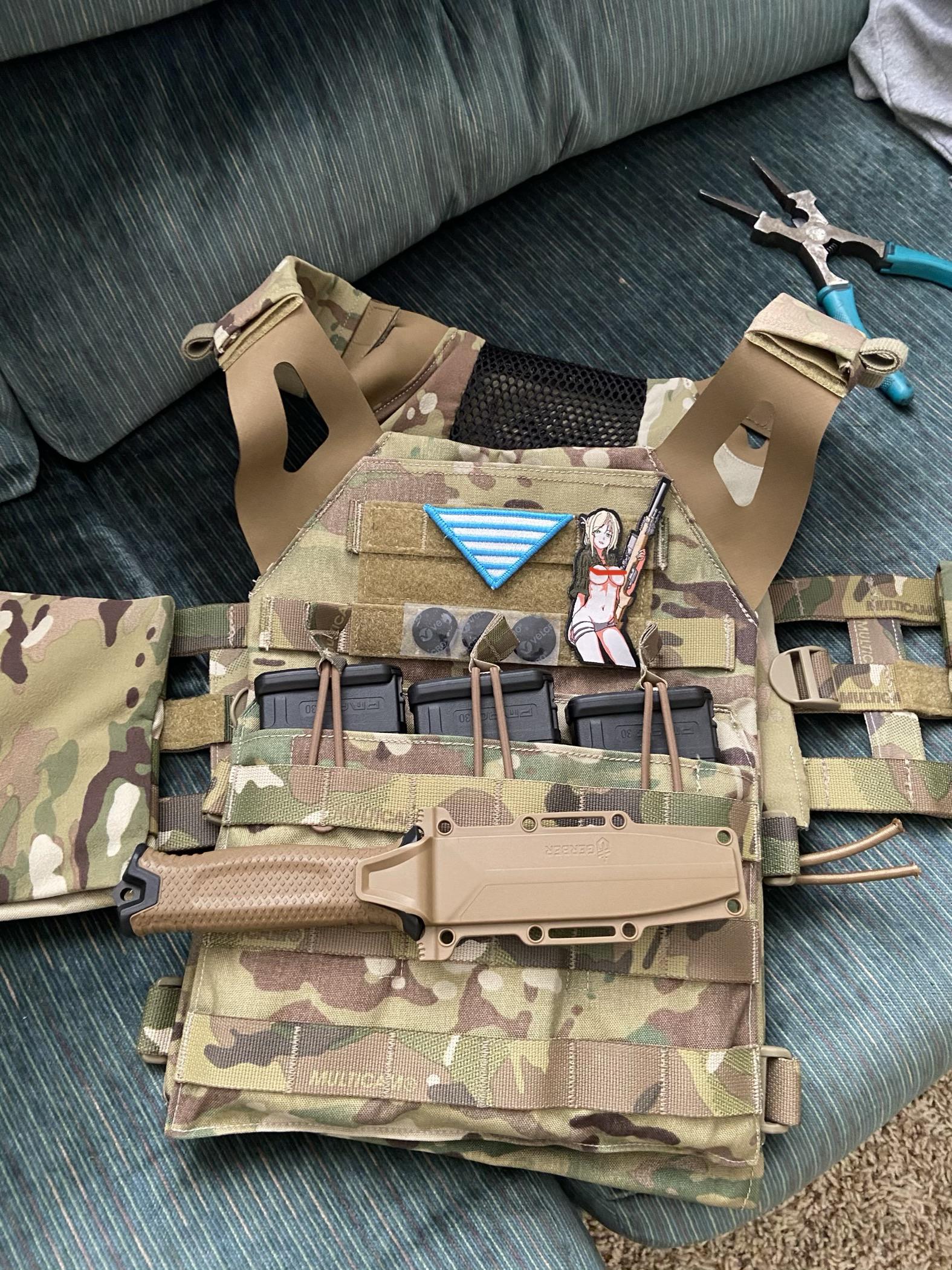 Any good places to molle a gerber strongarm to a crye jpc 1.0? Ideally