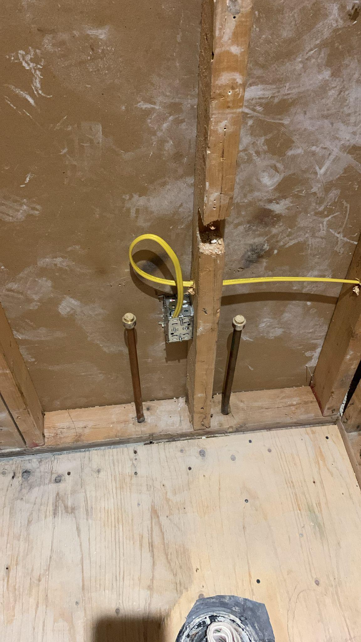 Outlet behind shower wall (cross posted) r/AskElectricians