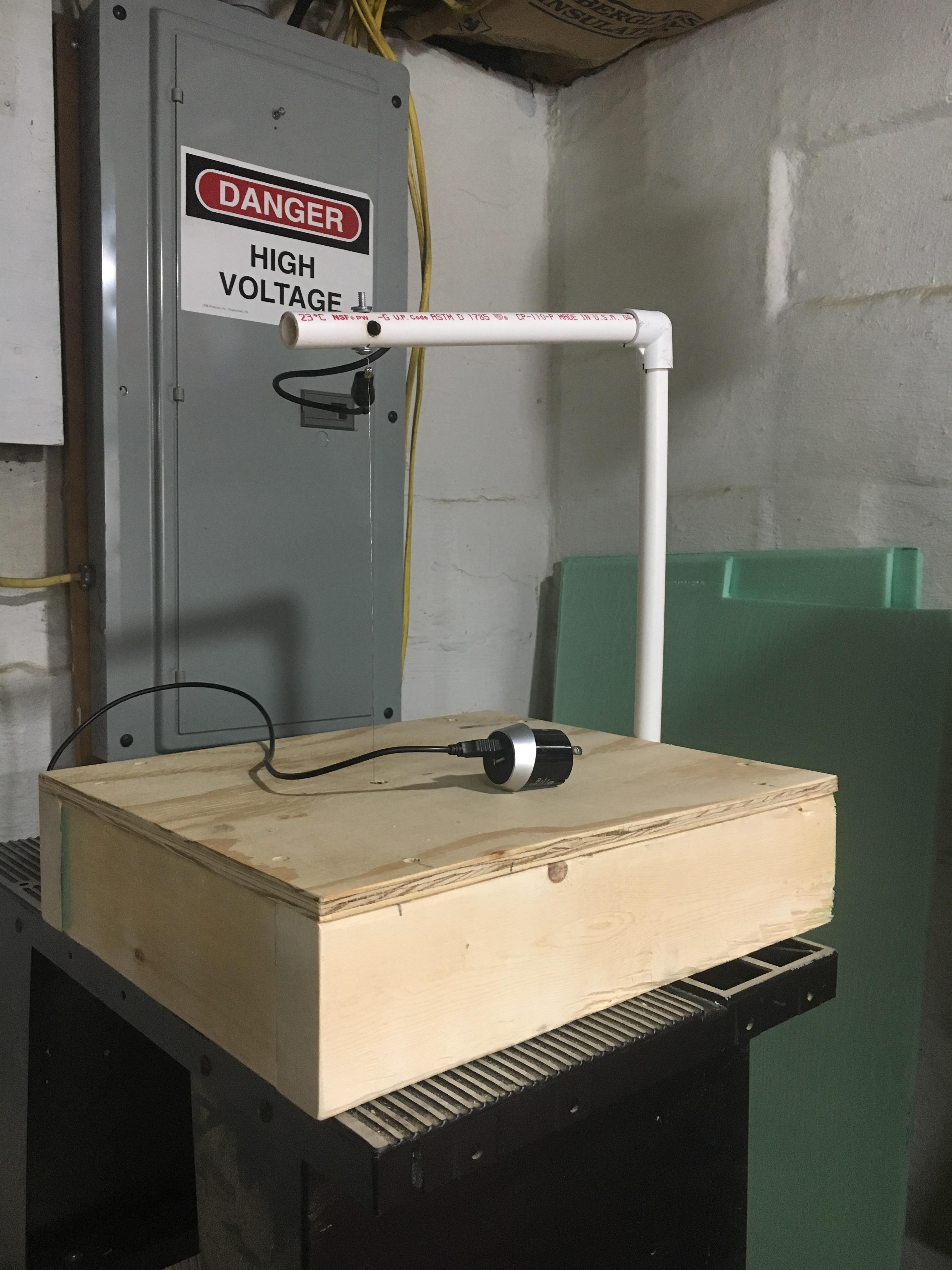 Made a hot wire foam cutter from a USB phone charger and some scrap