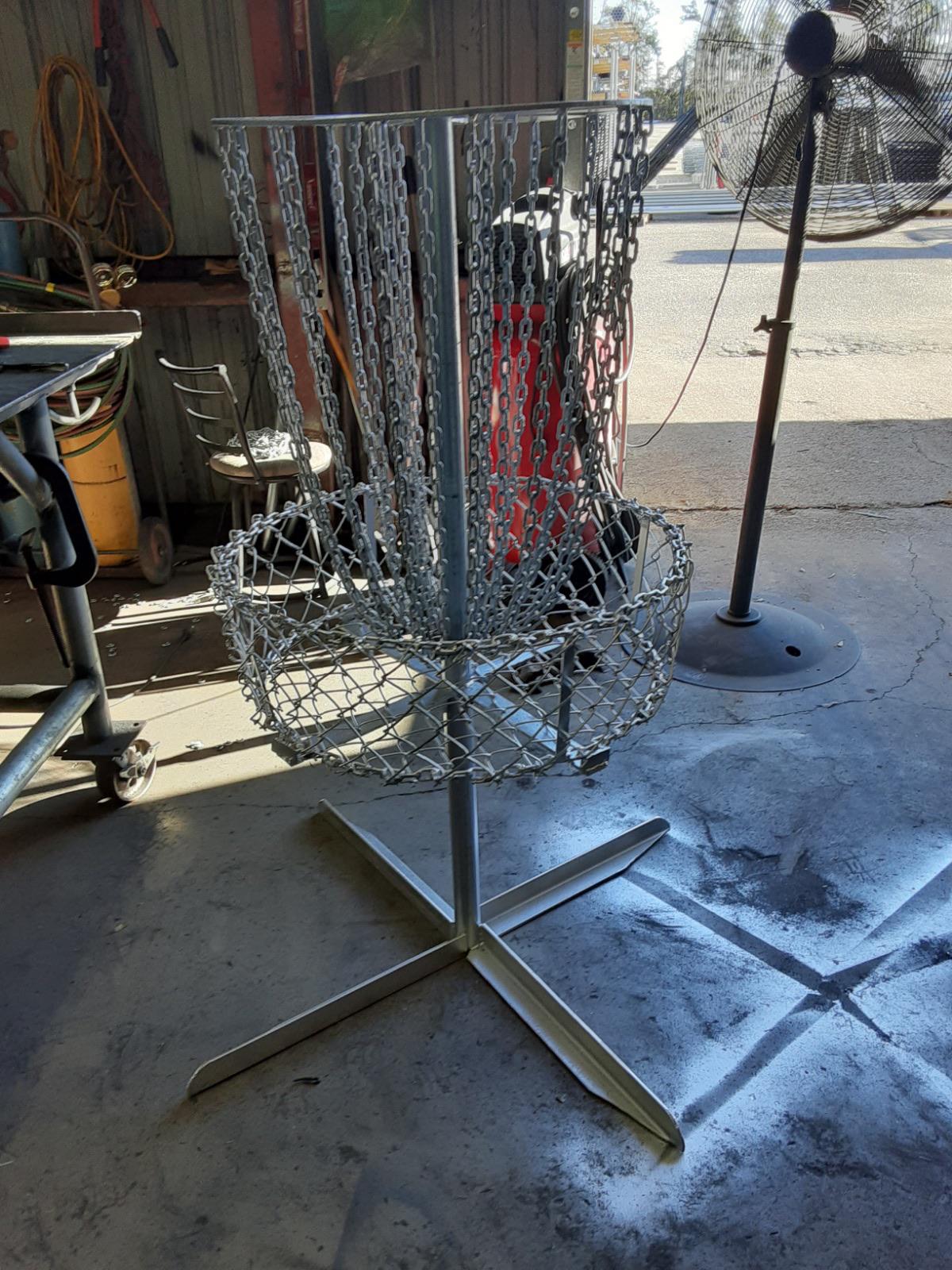 My dad makes Disk golf baskets in his free time. The basket is made of