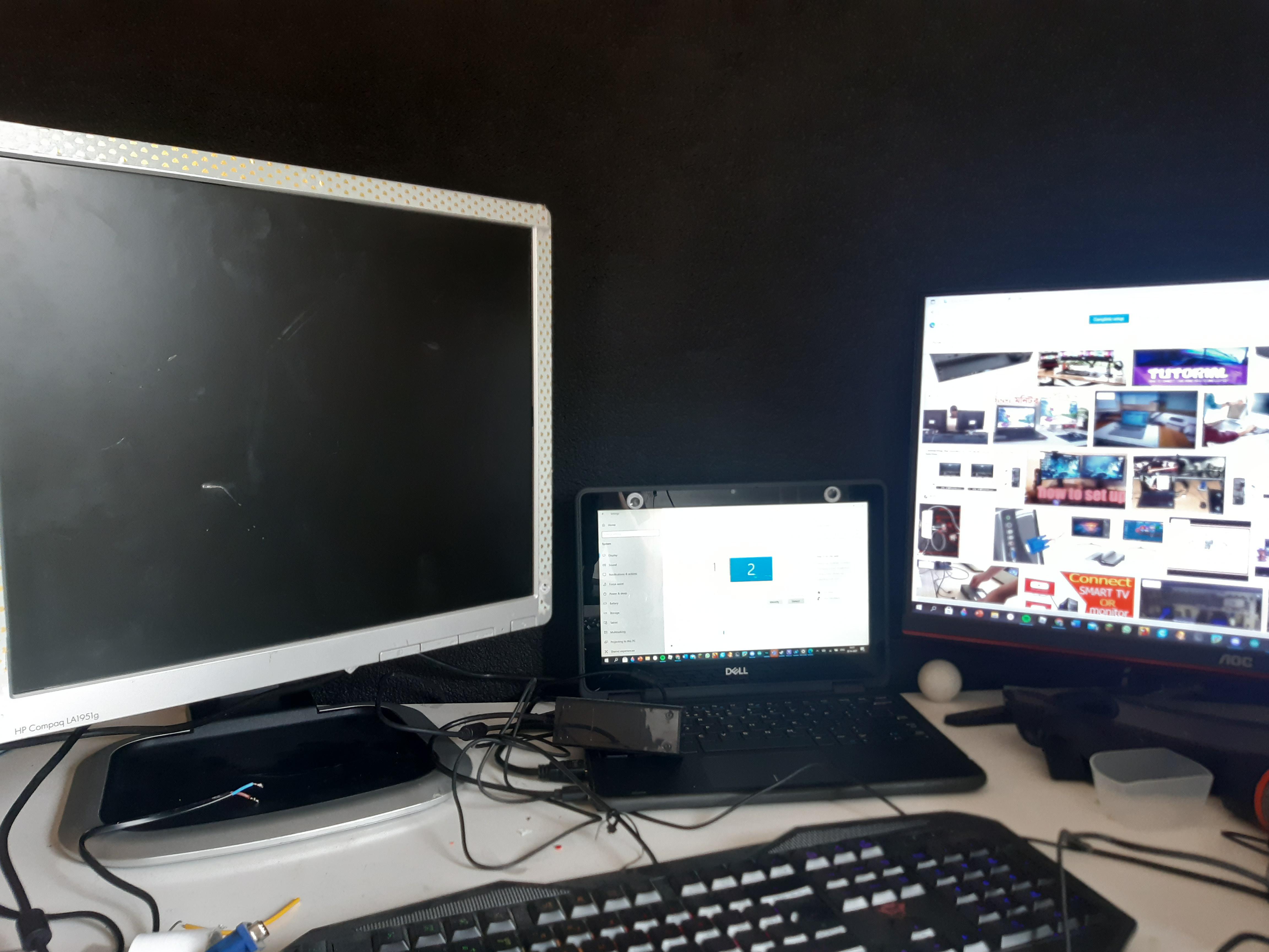 How can i connect the left monitor with my laptop (left monitor has vga