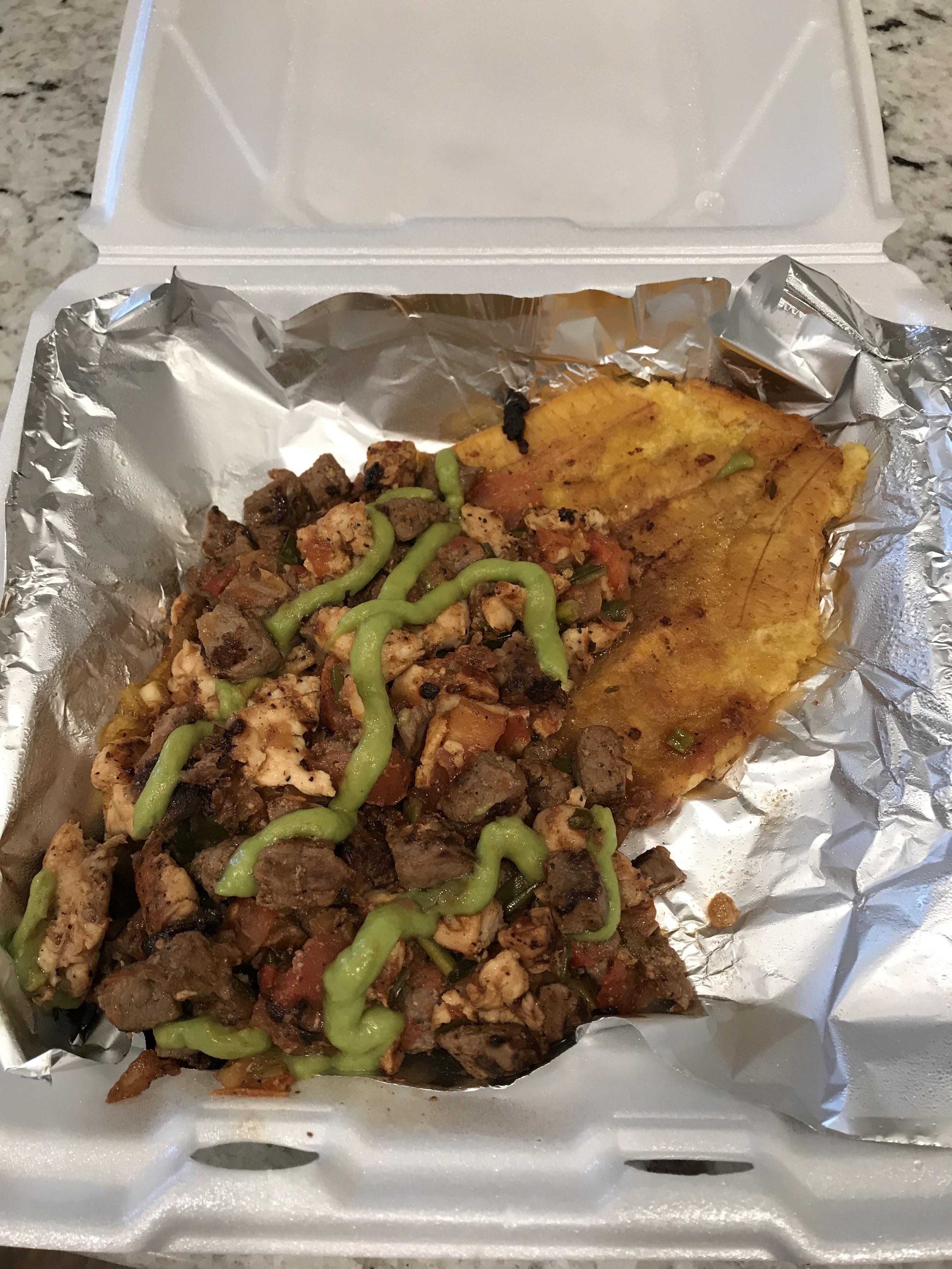 [I ate] Flattened Fried plantain with beef, chicken, and guac toppings