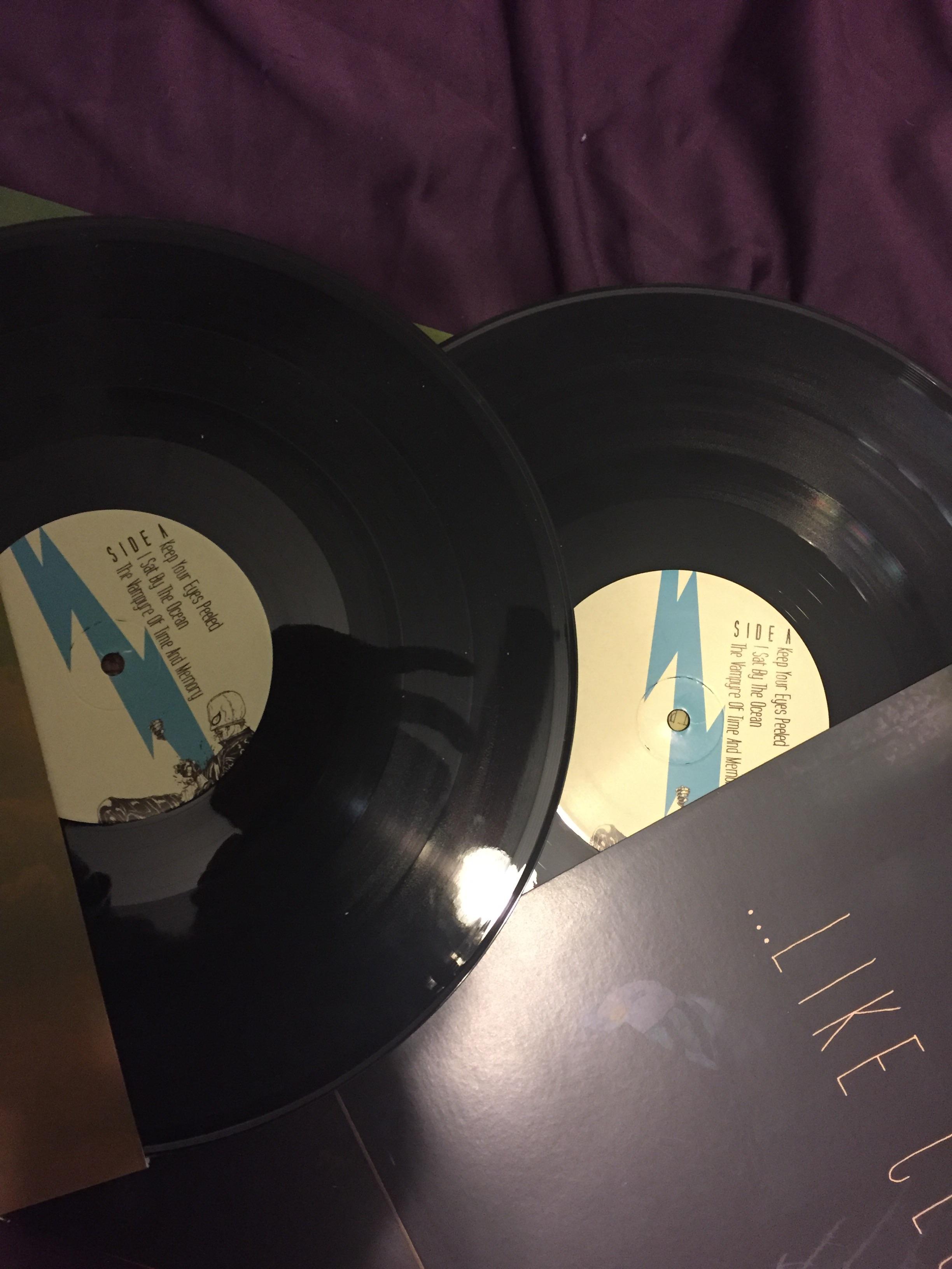 I boughtLike Clockwork on vinyl and got two A/B side records r/qotsa
