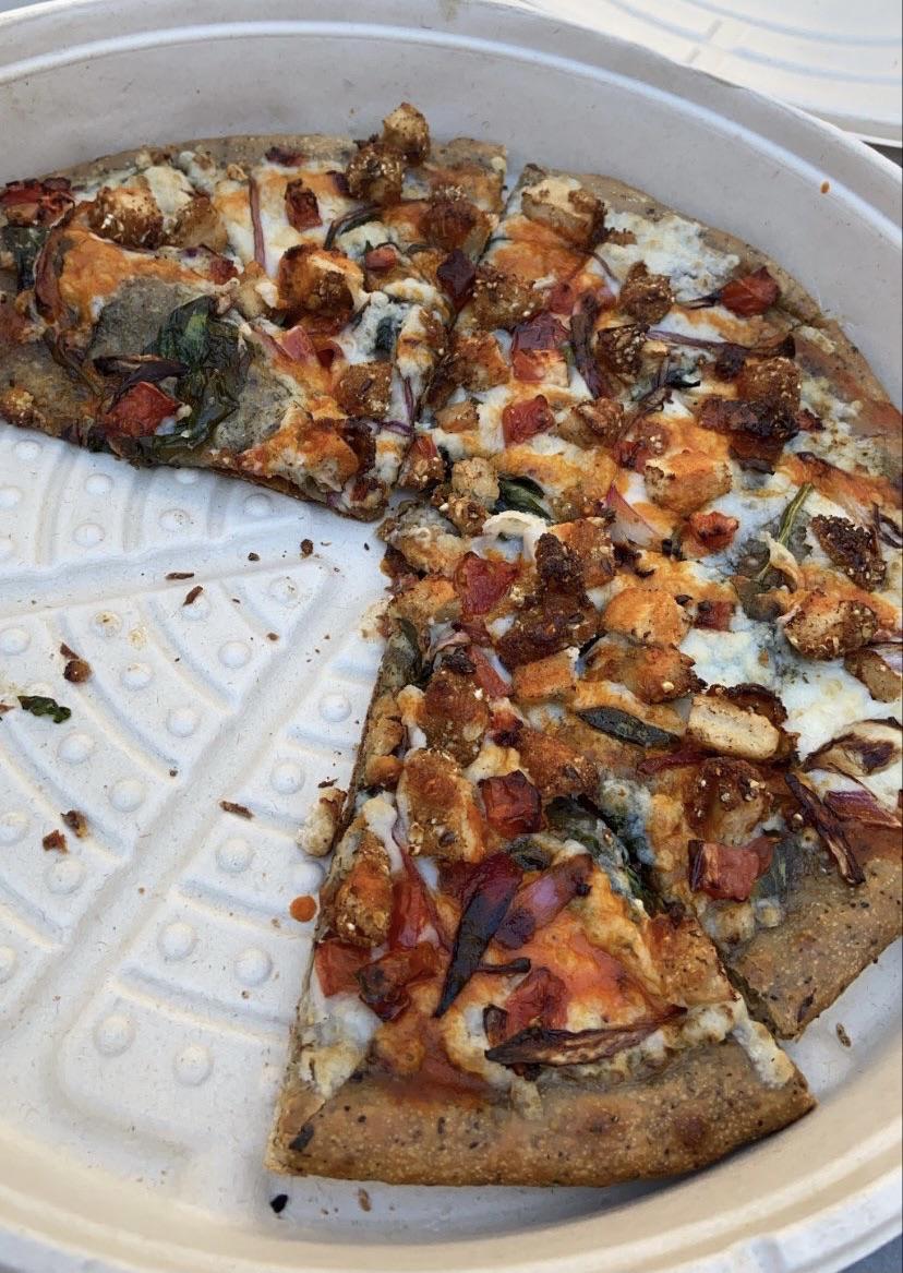Vegan buffalo chicken pizza from PlantBased Pizzeria in ATL. was