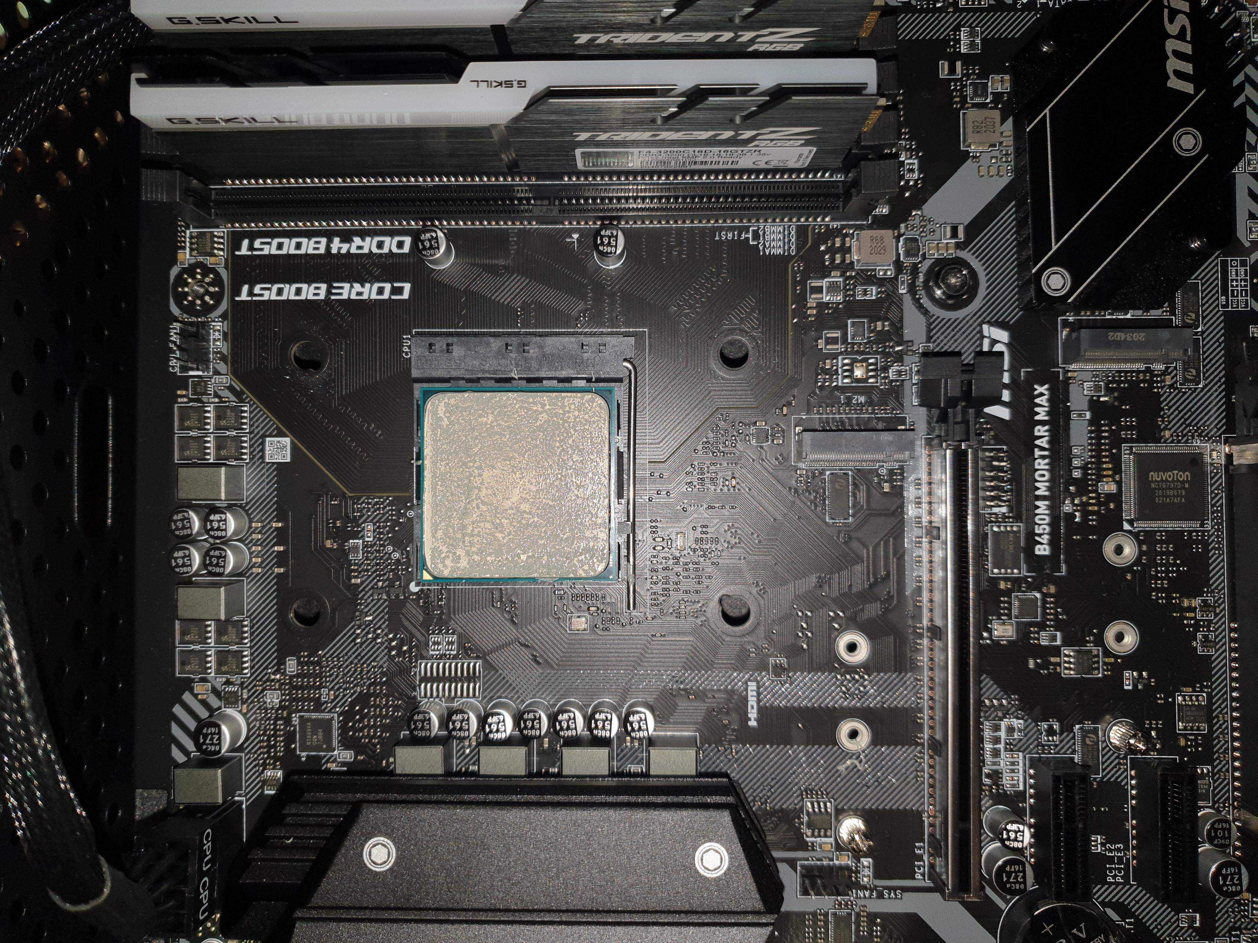 Anyone know what to do when the motherboard cooler standoffs are stuck