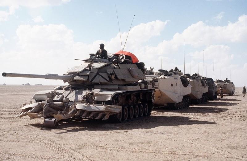 USMC M60A1 with mineplow and AAV7s during Operation Desert Storm, 1991. r/TankPorn