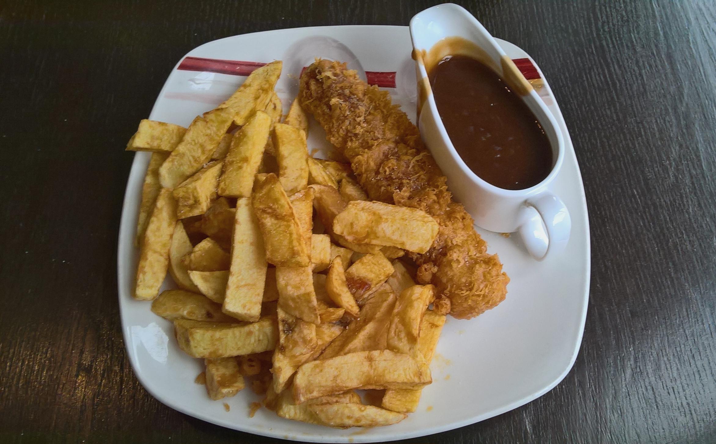 Battered sausage, chips and gravy. r/UK_Food